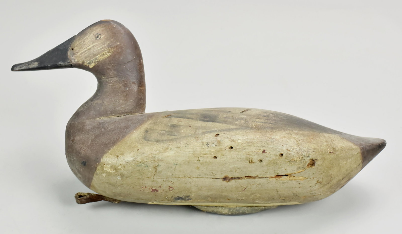 Sam Barnes, 1857-1926, Havre de Grace, MD, decoy: Sam Barnes, 1857-1926, Havre de Grace, MD, carved and painted duck decoy, 15" long. Collection of Richard Matlat, the carver attributions are based on notes attached to the decoys by the collector, or