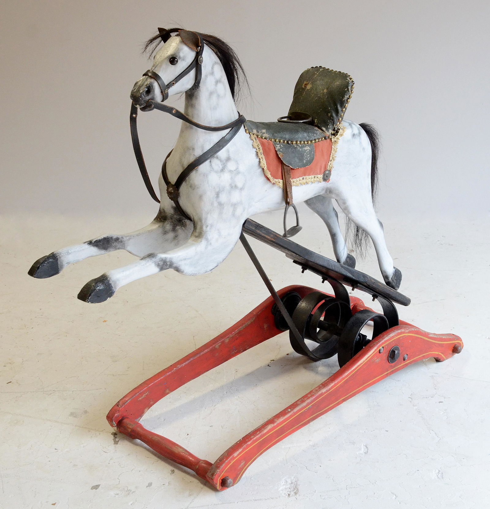 Dare rocking horse with spring mechanism: Dare rocking horse with spring mechanism, original red paint on base, horse restored, 40"l base, horse 42"h