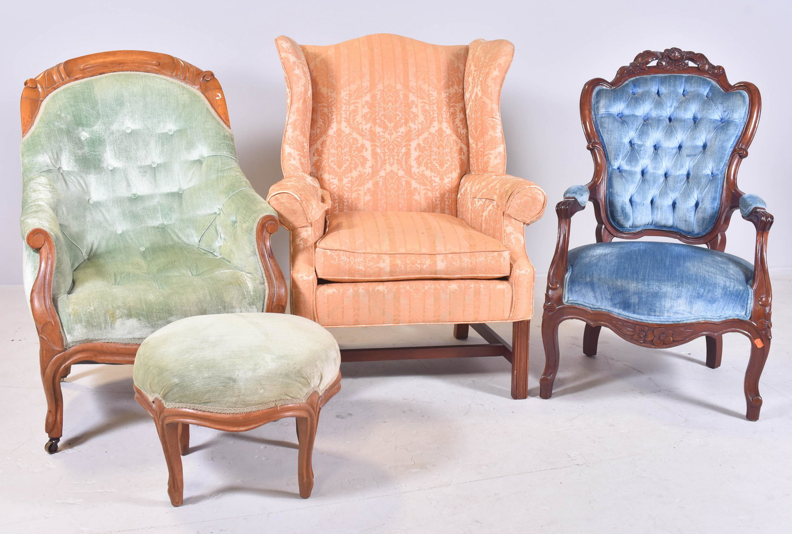 2 carved Victorian armchairs w/ stool, Chippendale: 2 carved Victorian armchairs w/ stool, Chippendale style wing chair, Victorian green tufted upholstered chair w/ ottoman, Victorian blue upholstered chair, Chippendale wing chair, 42" h, seat height 1