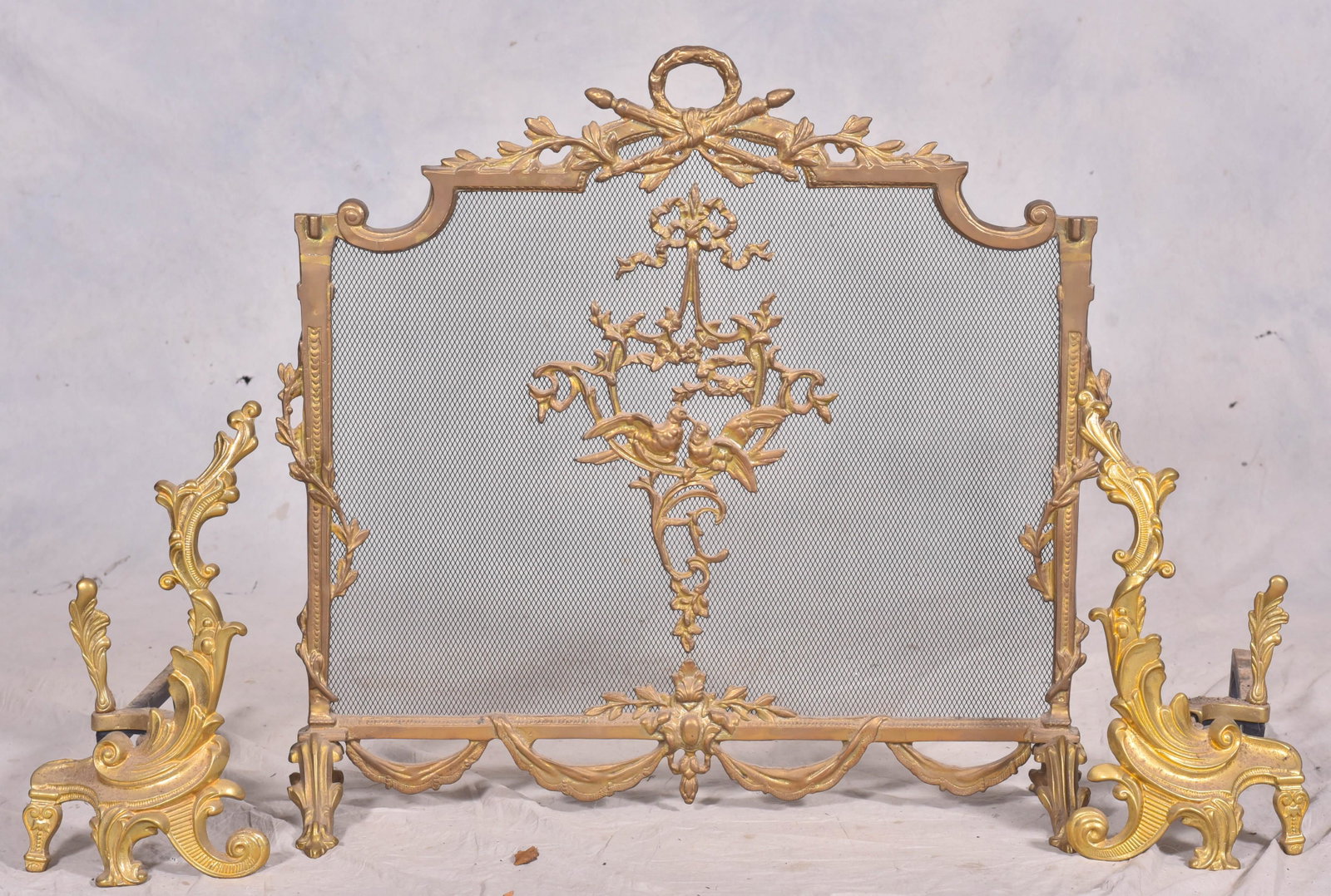 French style gilt metal firescreen and andirons: French style gilt metal firescreen and andirons, screen 27-1/2"h x 28'w