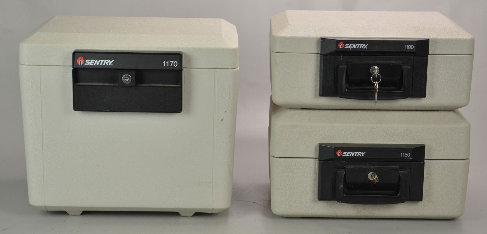 (3) Sentry fireproof safe boxes: (3) Sentry fireproof safe boxes, c/o Sentry 1100, Sentry 1170, and Sentry 1150, largest 13"h x 15-1/2"w x 11-1/4"d