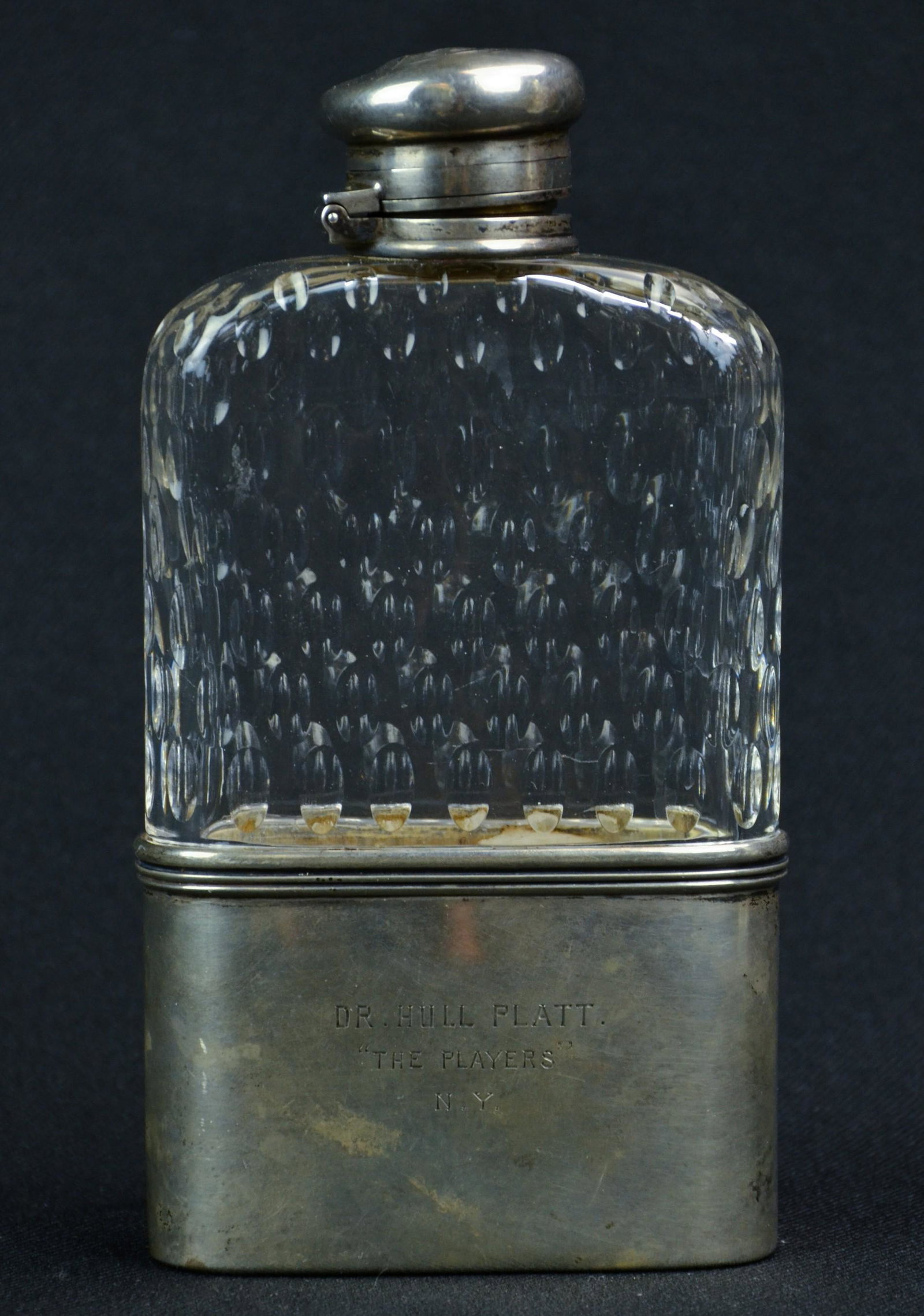 Tiffany Sterling Silver Flask: Tiffany sterling silver flask marked Tiffany and Co 8461, Makers 7928. Engraved " Dr. Hull Platt, The Players, N.Y." 6.5" h, 1 1/2 gills. Dent at lid
