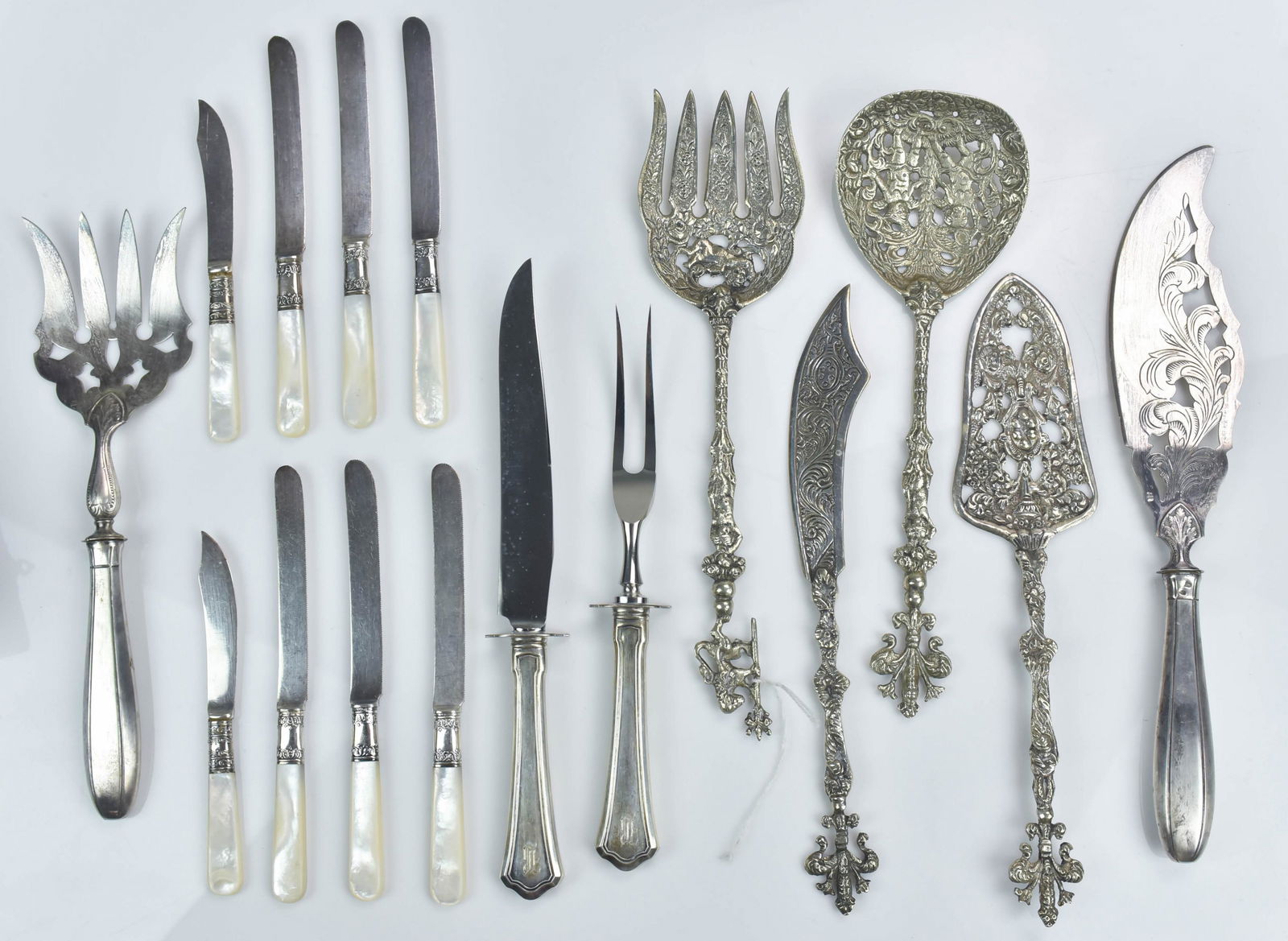 Silver and Plate Serving Group: Silver and plate serving group c/o 19th c. French plate fish server in box, (4) ornate plate serving utensils, Wallace sterling handled carving set and (8) sterling banded MOP knives