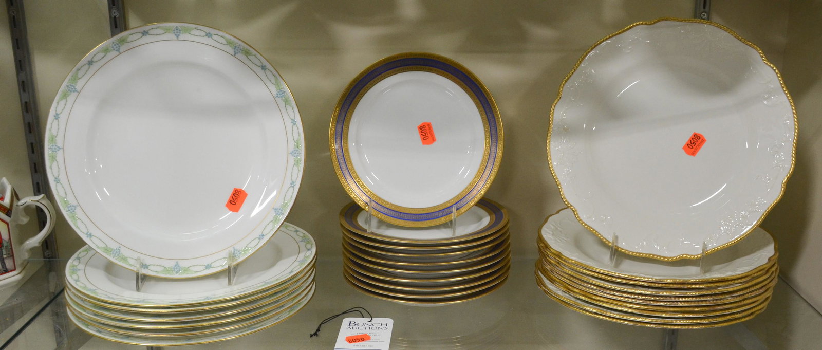 Shelf #29 - Porcelain Plates, Limoges, Spode, Minton: Shelf #29 - Porcelain plates, c/o (7) Mintons with Art Deco enameled border, 10-3/8" dia, (10) TV Limoges with blue & gold border, 7-5/8" dia, (10) Spode with swag embossed border & scalloped gadroone