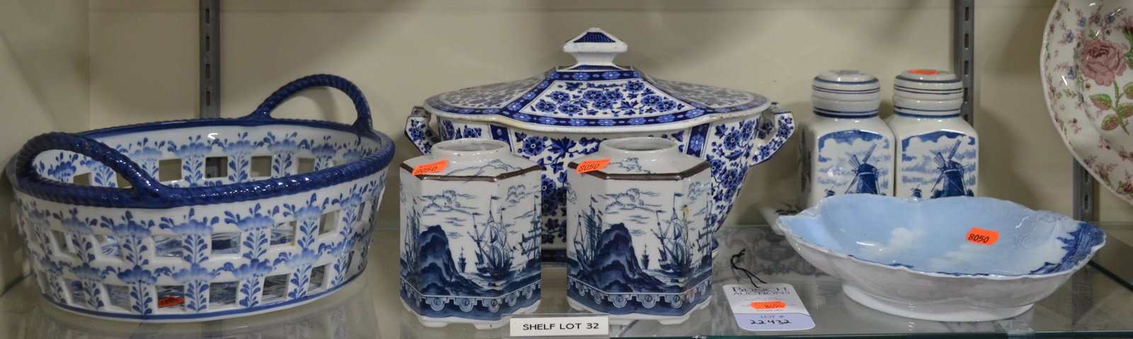 Shelf #32 - Blue and White Porcelain: Shelf #32 - Blue and White Porcelain Including: Maitland Smith Handled Basket, Hawthorne Tureen, (2) Delft Canisters with Tray, Hexagonal Jars with Ship Decoration, German Plate with House