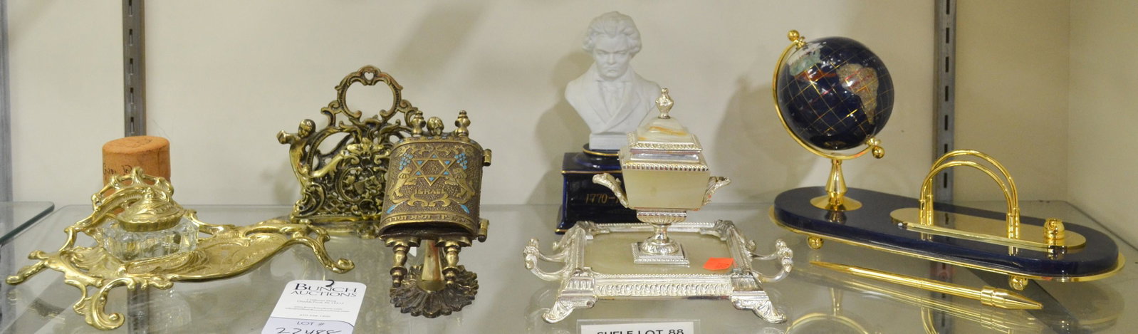 Shelf #88 - Modern Desk Items: Shelf #88 - Modern desk items c/o nouveau style lidded inkwell in brass, pierced brass letter holder, mounted globe letter holder and pen stand with broken pen, silverplate and quartz inkwell urn, dim