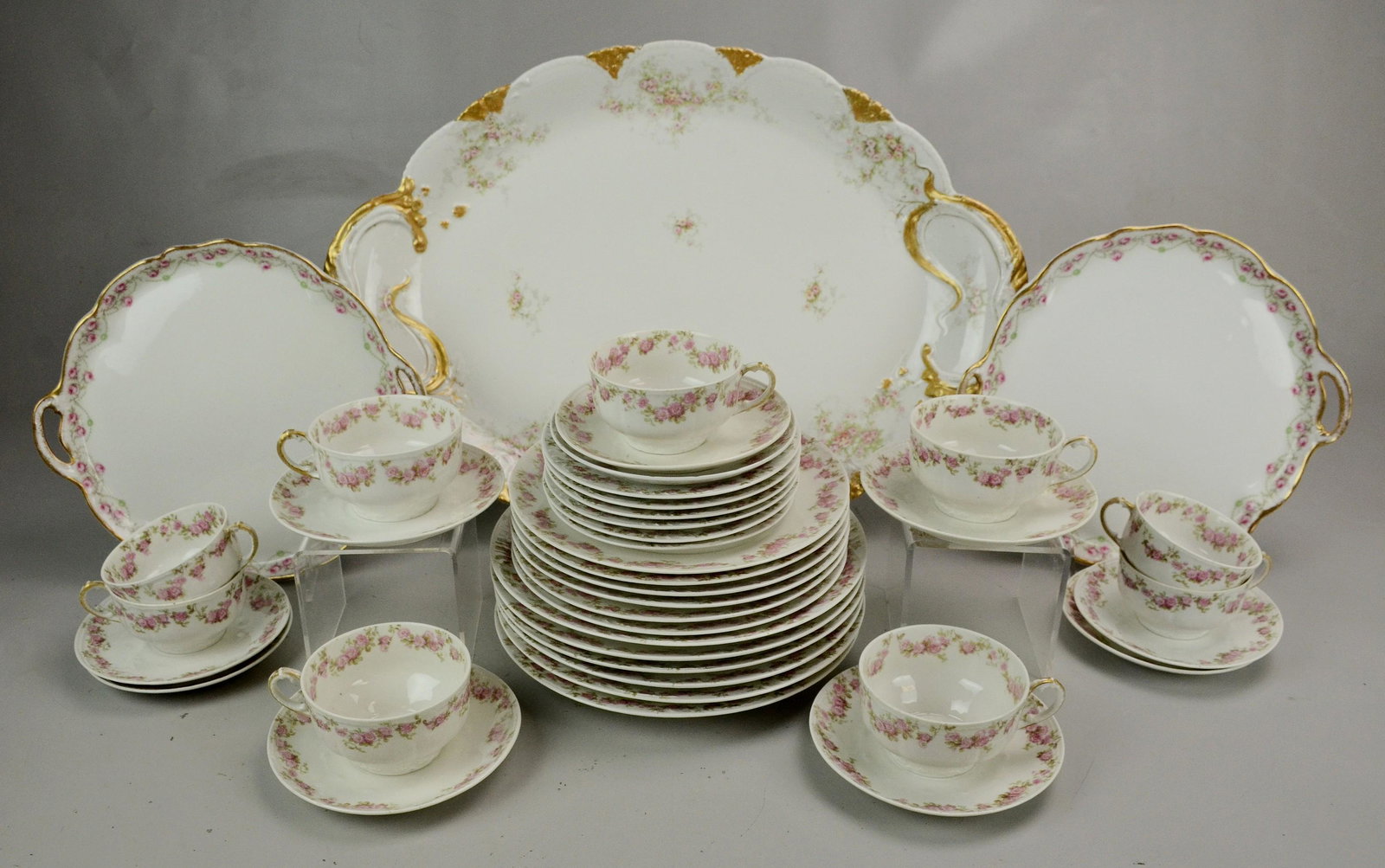 (40) Pcs Limoges Pink Roses Dinnerware: (40) Pcs Limoges dinnerware, pink roses, c/o 6 dinner plates, 6 salad plates, 6 B&B plates, 9 teacups, 10 saucers, large oval platter (similar), 2 cake dishes (similar)