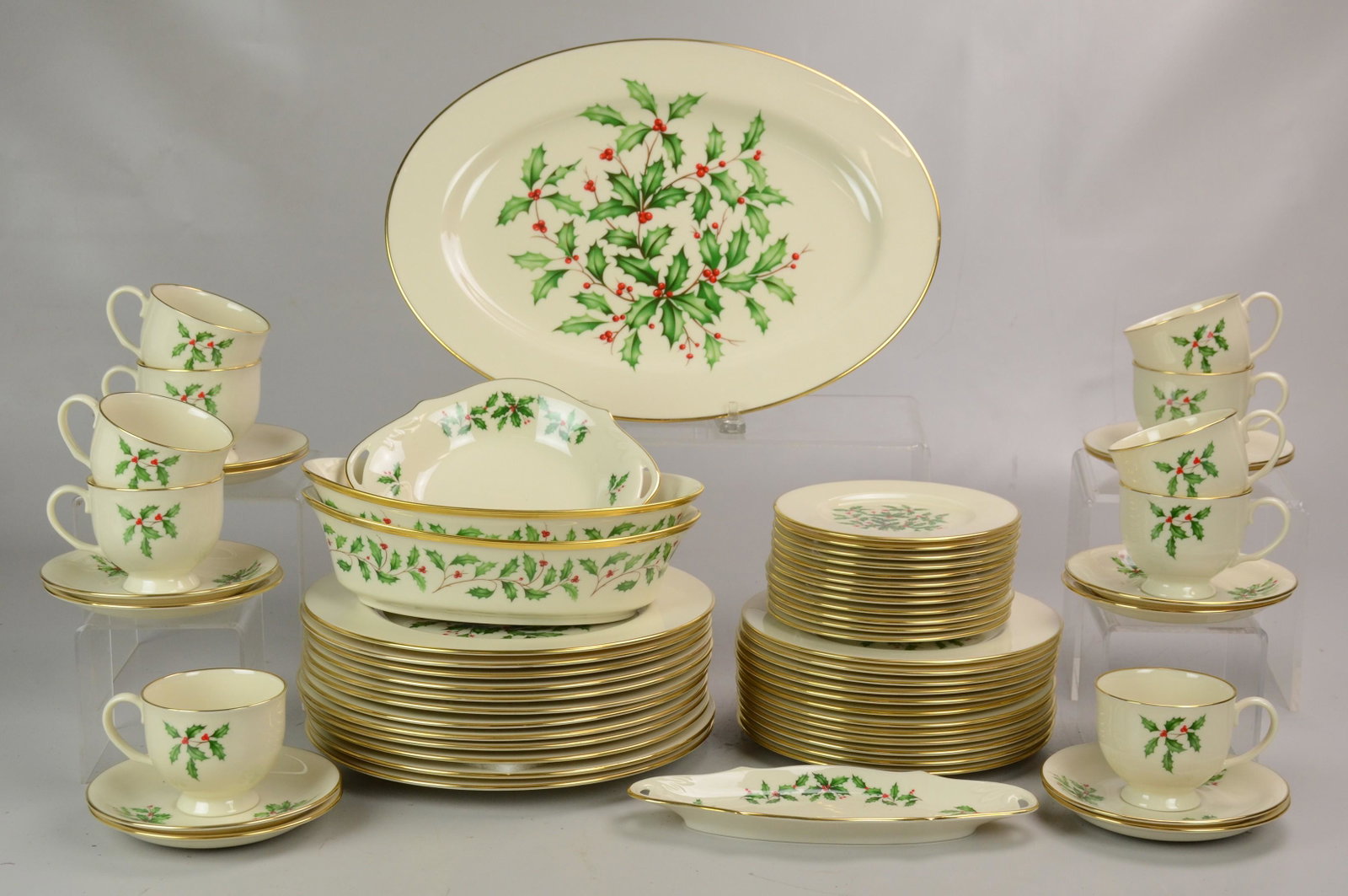 (63) Pcs Lenox Special Holly Dinnerware: (63) Pcs Lenox dinnerware, Special Holly pattern, c/o 12 dinner plates, 12 salad plates, 12 B&B plates, 10 teacups, 12 saucers, 2 oval serving bowls, oval platter, 2 relish dishes