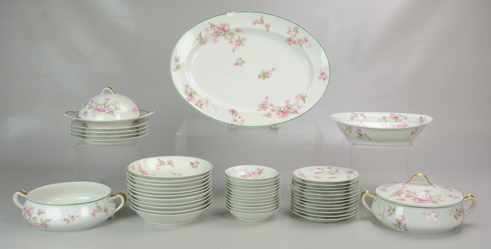 (45) Piece Haviland Limoges Dinnerware: (45) Piece Haviland Limoges Schleiger Pink Flowers Dinnerware Including: (4) Salad Plates, (12) B and B Plates, (12) Fruit Bowls, (11) Soup Bowls, (1) Oval Serving Bowl, (1) Oval Platter, (1) Open Cas