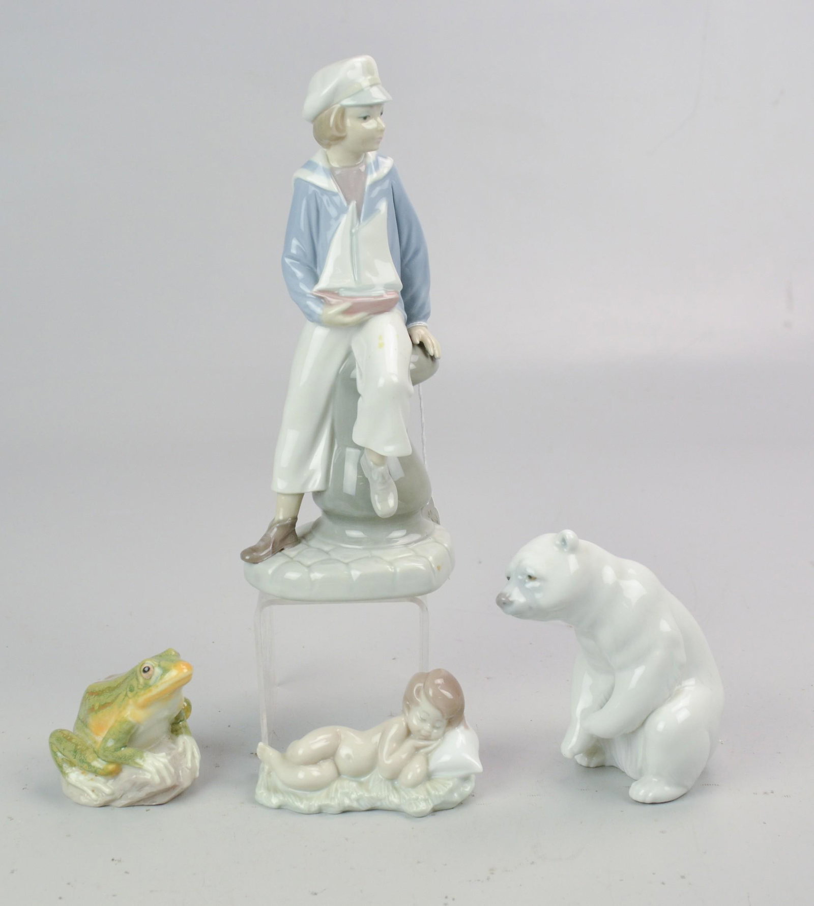 (4) Lladro Figures: (4) Lladro figurines, c/o Sailor Boy, baby Jesus, polar bear, frog, tallest 9"