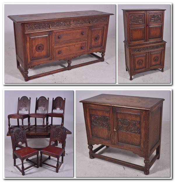 (9) pc Jacobean style carved oak dining set by Feudal: (9) pc Jacobean style carved oak dining set by Feudal Oak, c/o refectory dining table, 5 side chairs, buffet, sideboard, china, dining table 31" h x 70-1/2" w x 38-1/4" d, two 24" pull out slides, sid