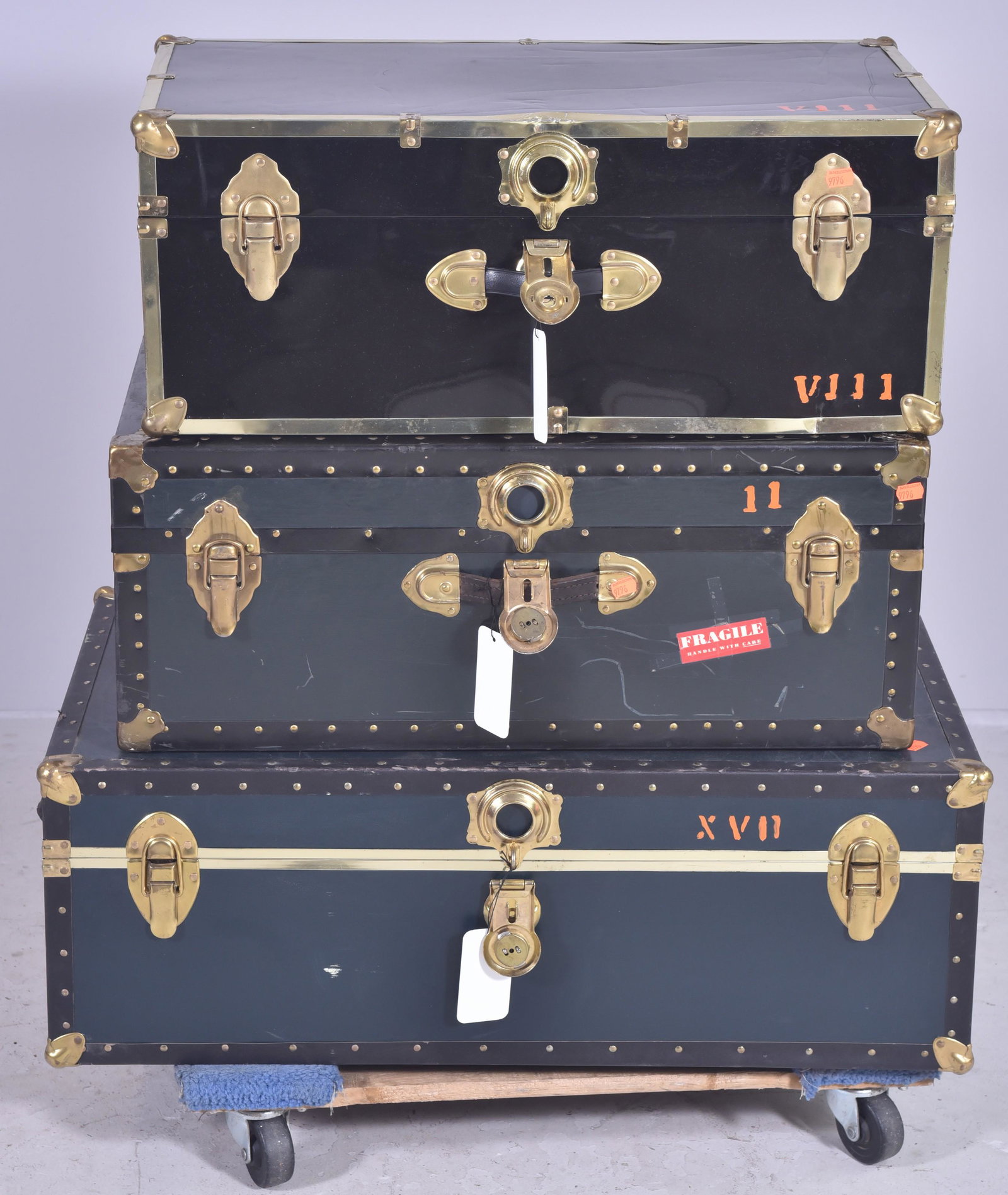 (3) Storage trunks: (3) Storage trunks, metal strapping, 30" w x 15-1/2" d, some with damaged locks