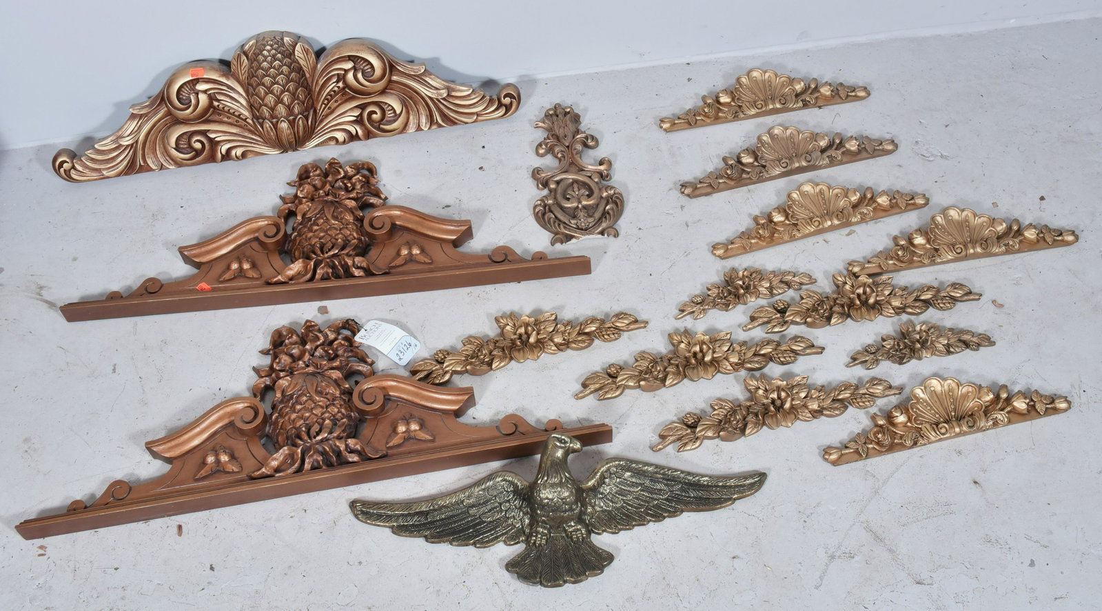 (16) Pcs.: Composite Architectural Elements: (16) Pcs. c/o composite architectural elements and a brass eagle, largest 13" h x 36" w x 2" d