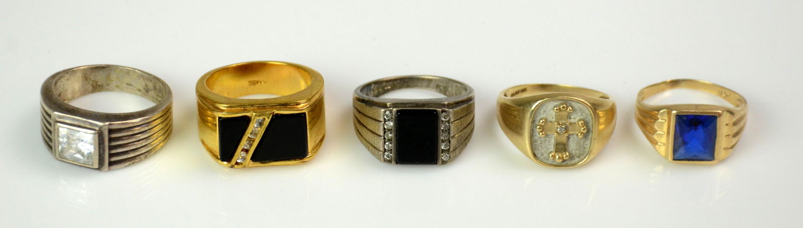(5) Rings: (5) Rings, 14K YG w/ Blue Topaz stone (Size 9-1/2), 2.2 dwt, 10K w/cross, 3.2 dwt, (2) sterling, .65 TO, 1 18K HGE