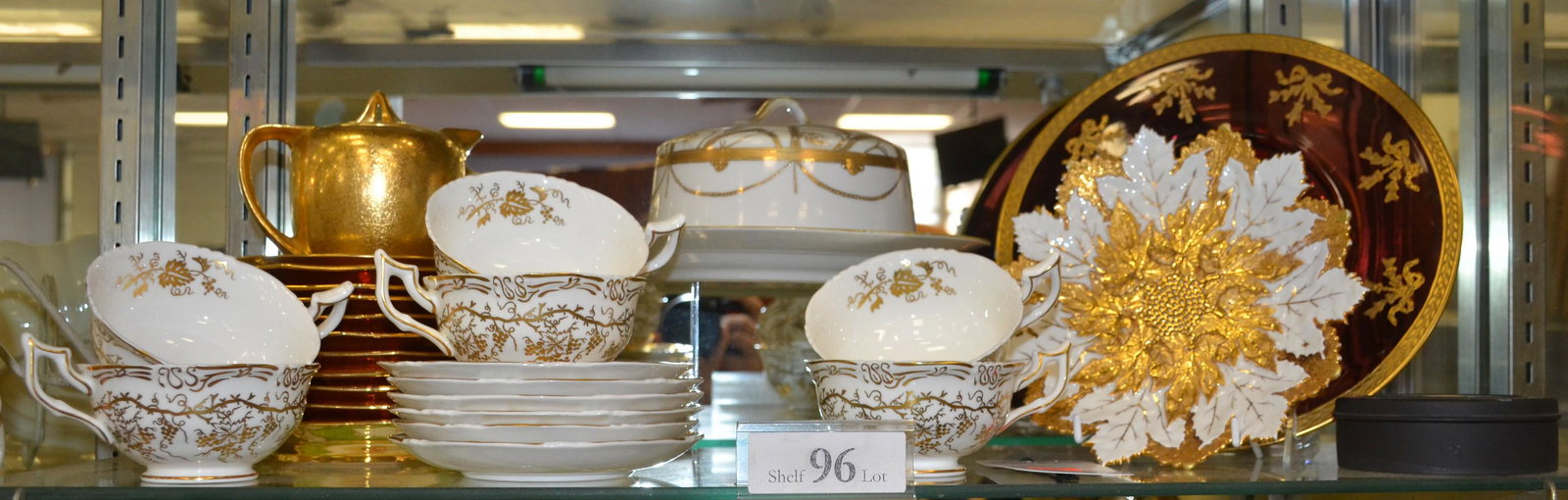 Shelf #96- Porcelain and Glass Grouping: Shelf #96- Porcelain and glass grouping c/o (6) Coalport Queens Plate cup and saucers, Nippon gold wheat covered dish, Pickard pot and underplate in gold, (10) textured gold unmarked porcelain plates,