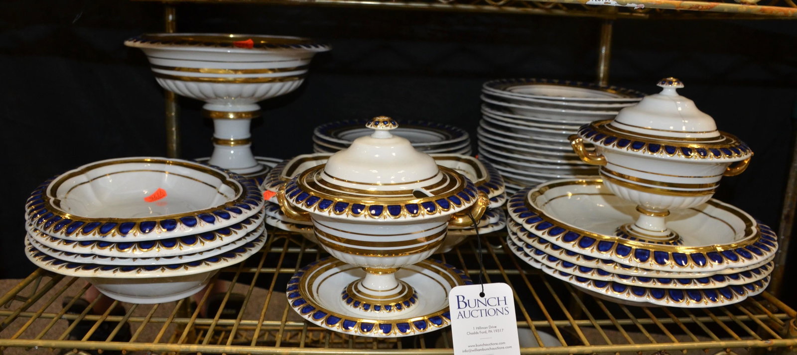 (39) Pcs Davenport Dinnerware: (39) Pcs Davenport porcelain dinnerware, cobalt blue & gold, c 1815-1830, c/o 24 dinner plates (8 damaged), 4 rectangular serving bowls (1 damaged), 4 oval serving bowls, 4 round serving bowls (2 dama