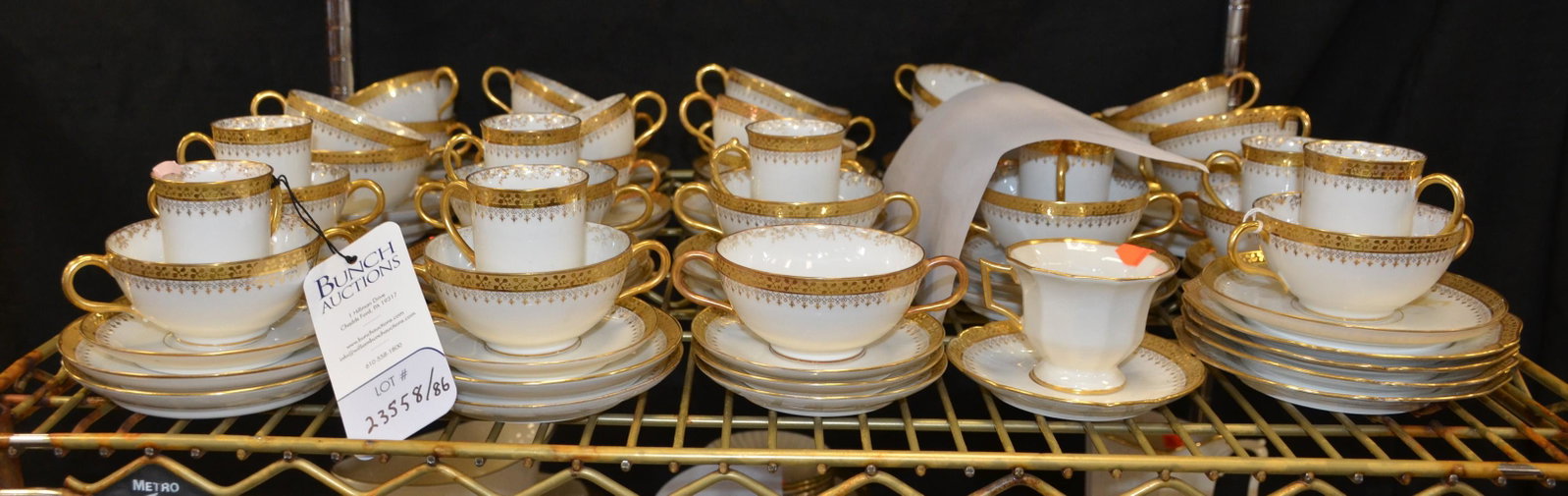 (86) Piece WM Guerin and Co. Limoges White Medallion: (86) Piece WM Guerin and Co. Limoges White Medallion Pattern Dinnerware Including: (4) B and B Plates, (9) Teacups, (33) Saucers, (9) Demitasse Cups, (12) Demitasse Saucers, (19) Bouillon Cups