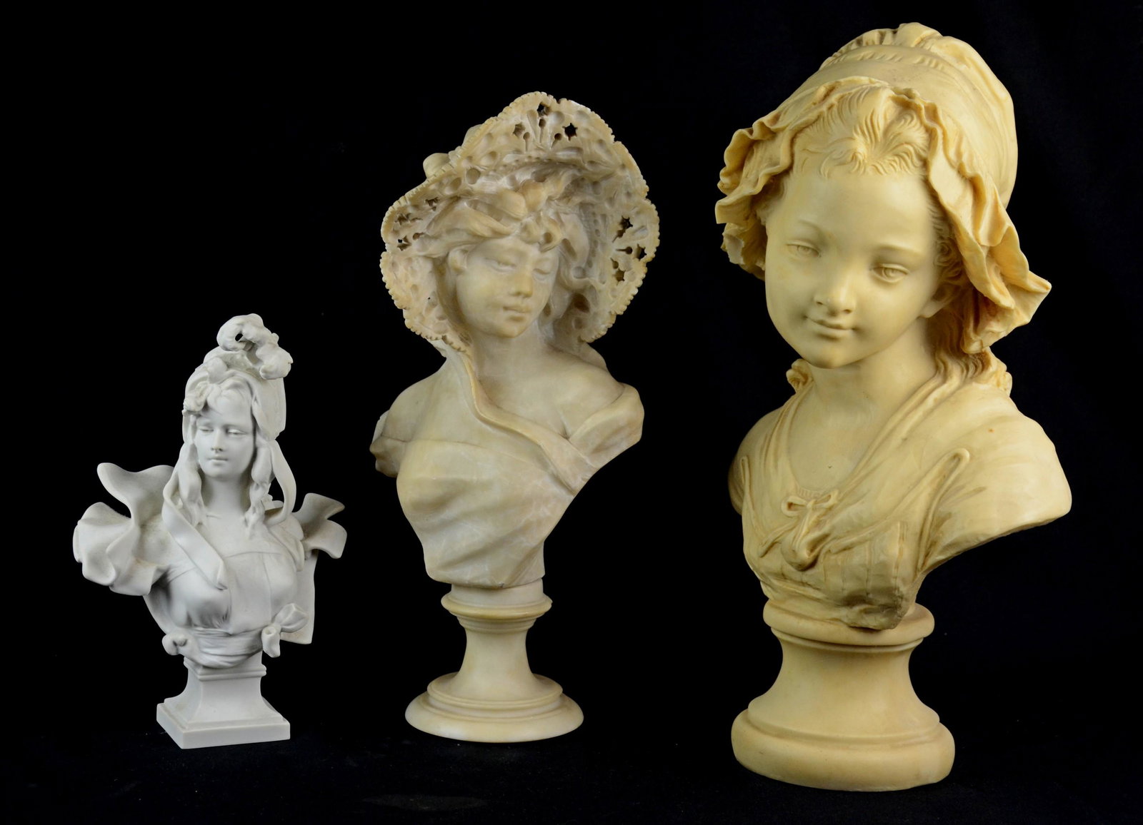 (3) Women Bust Sculptures: (3) Women bust sculptures, c/o unsigned alabaster with lace bonnet, 16-3/8", resin signed Paris Grinam Niam, 18-1/4" h, composite signed Levi 1990, 10-3/4" h