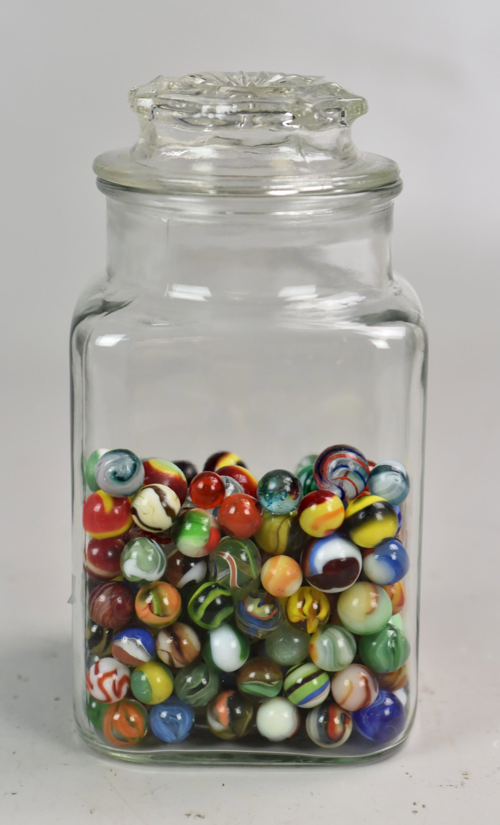 (258) Marbles in Store Jar: (258) Marbles in glass store jar