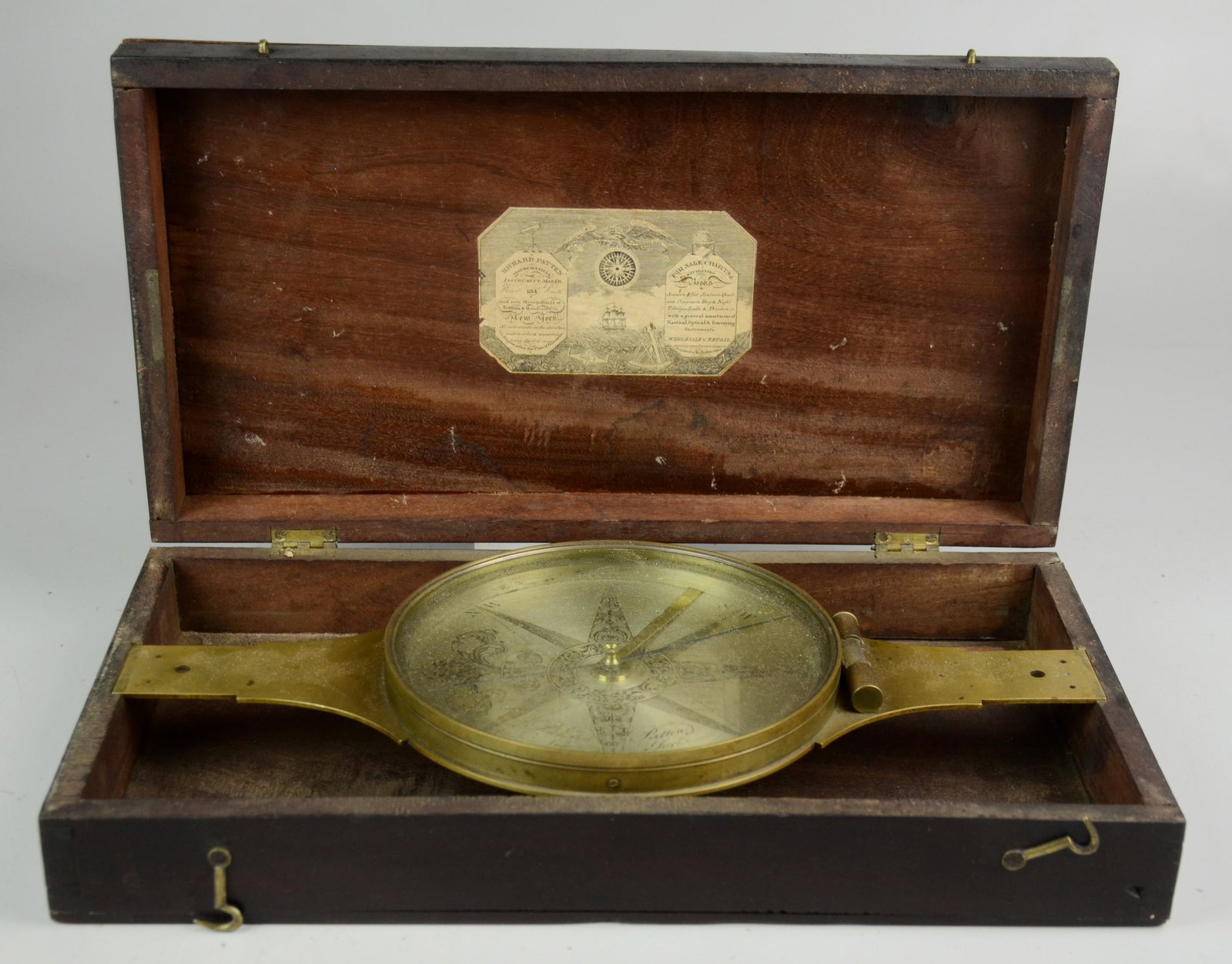 Brass ship's compass by Richard Patten, New York: Brass ship's compass by Richard Patten, New York, brass frame, contained in original mahogany case, paper label in lid, 6"dial, case 15" x 8"