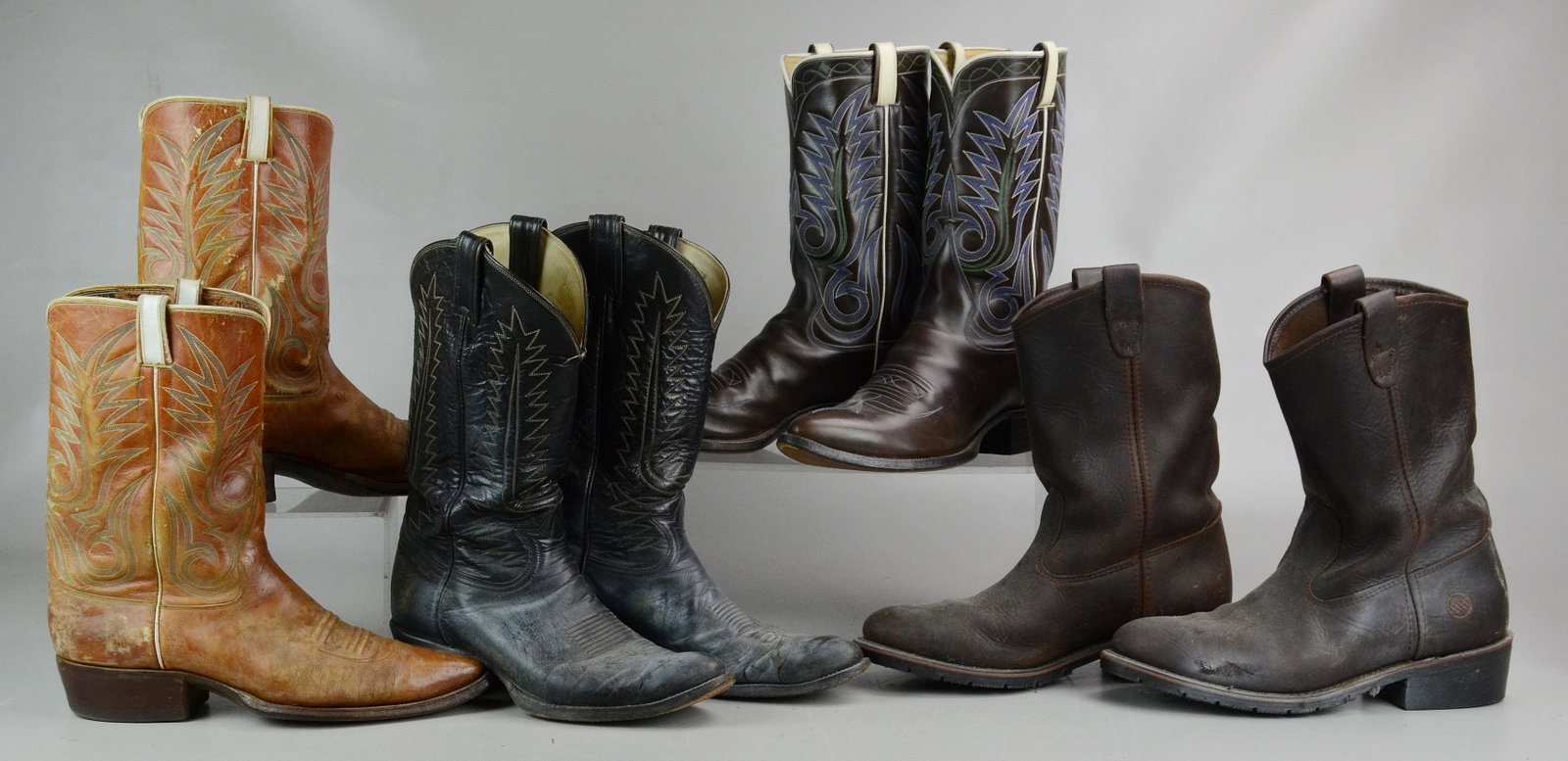 (3) pr tooled leather cowboy boots, work boots, size 10: (3) pr tooled leather cowboy boots, worn black pair by Tony Lama, black pair in good condition signed Joe Allen, tan pair fairly worn, plus a pr of work boots, size 10