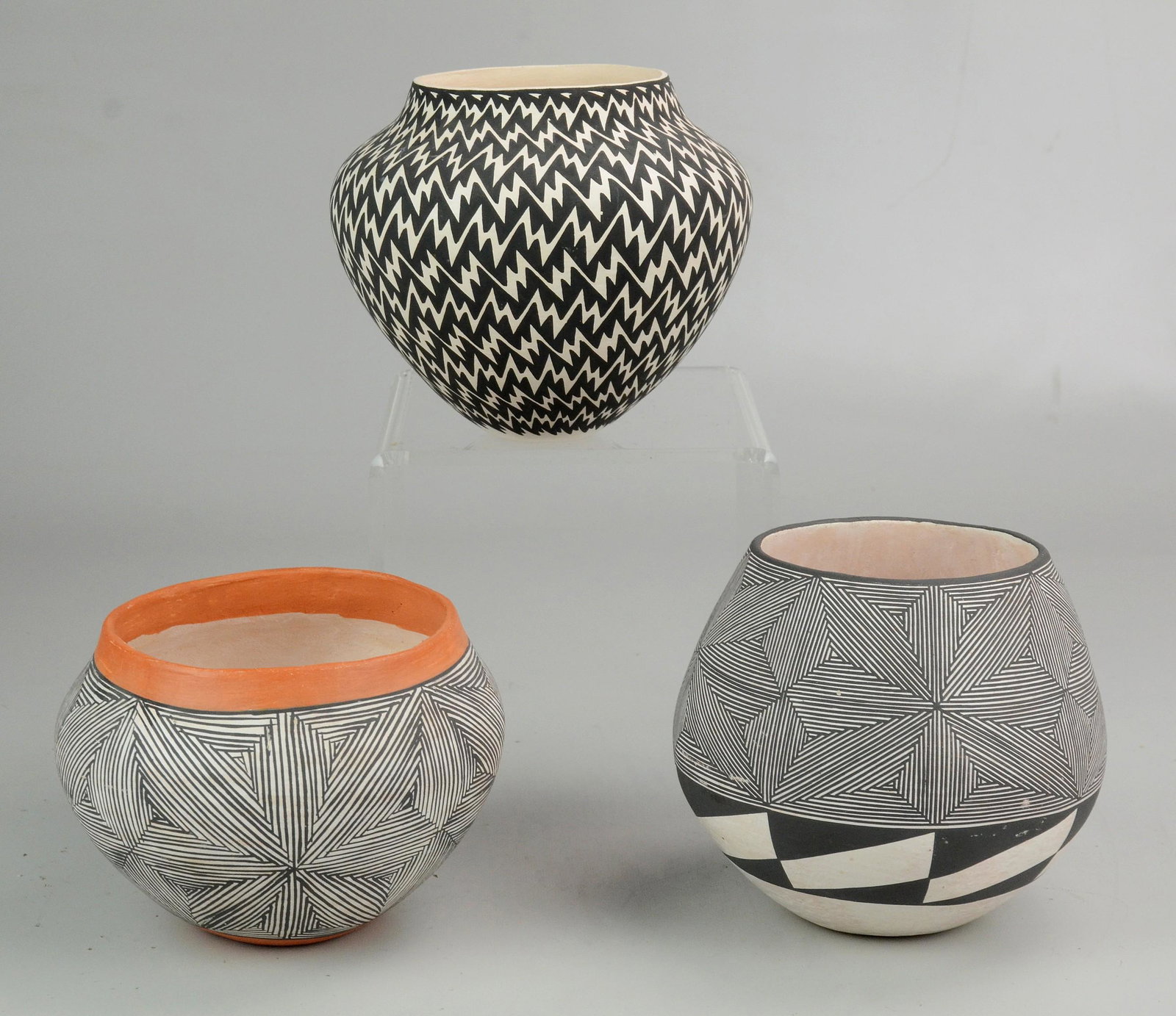 (3) Acoma Native American Pottery items, Jennifer: (3) Acoma Native American Pottery items, Jennifer Estevan, Lightning jar, 5 1/4" h, 6" d; Carla Garcia, jar, 5 1/4" h, 6" d; N Wilson, jar, 4 1/2" h, 6" d
