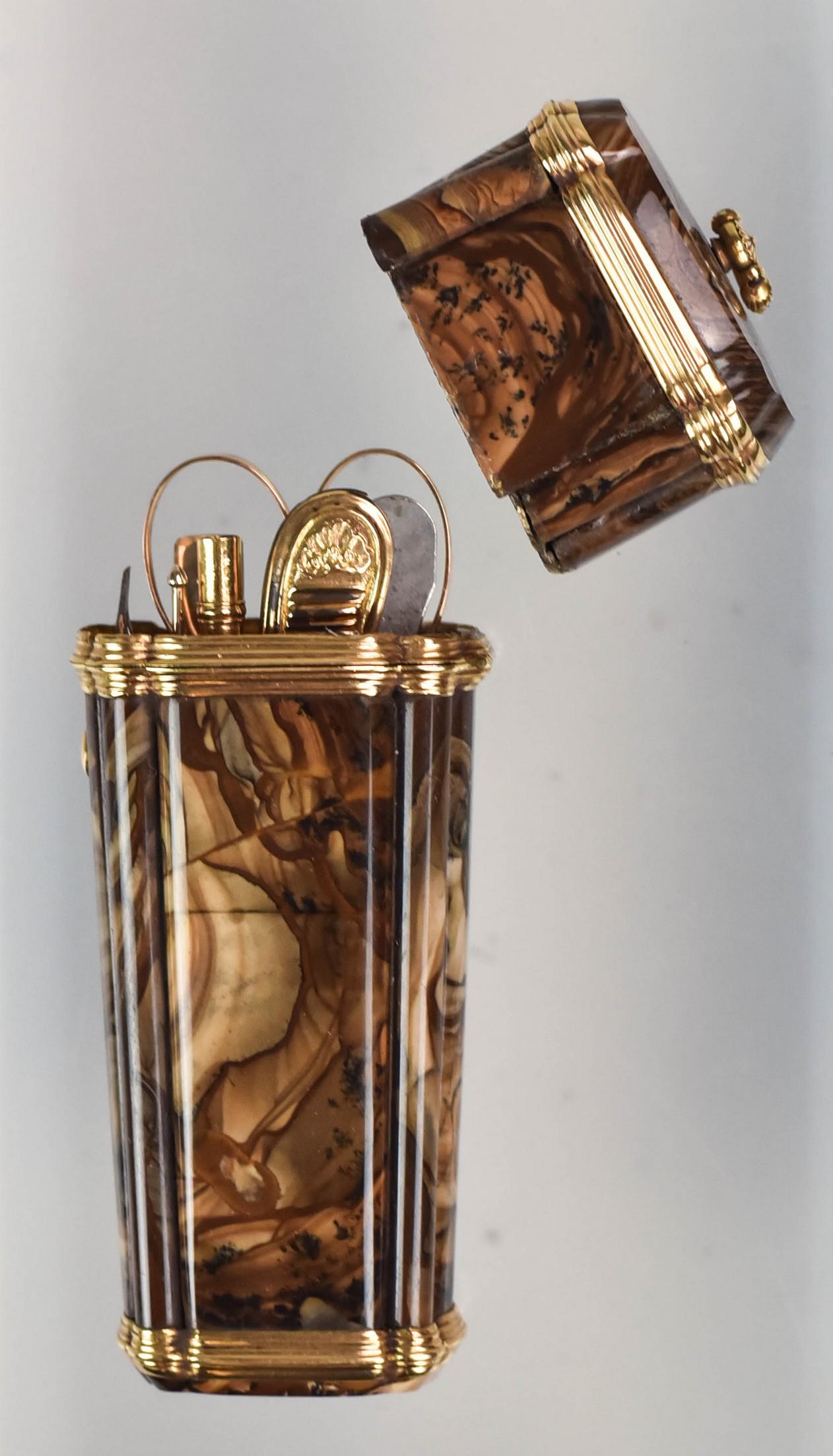 Gold Mounted Agate Ladies Necessaire: Gold mounted agate ladies necessaire etui, unmarked tests 10K, contains folding knife, scissors, tweezers with snuff spoon, pen, bone writing slip, bodkin, 3-5/8" h, lid needs to be reattached