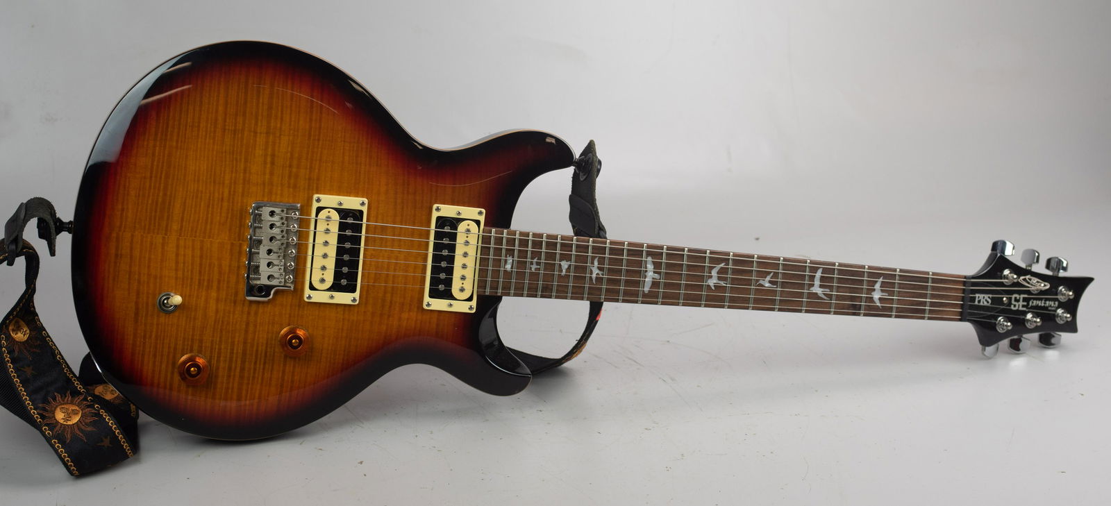 Paul Reed Smith (PRS) SE Santana Electric Guitar: Paul Reed Smith (PRS) SE Santana model 6-string electric guitar, mother of pearl inlaid birds on neck, 37-1/4" l, 2013, SN N13539, with soft side gig bag