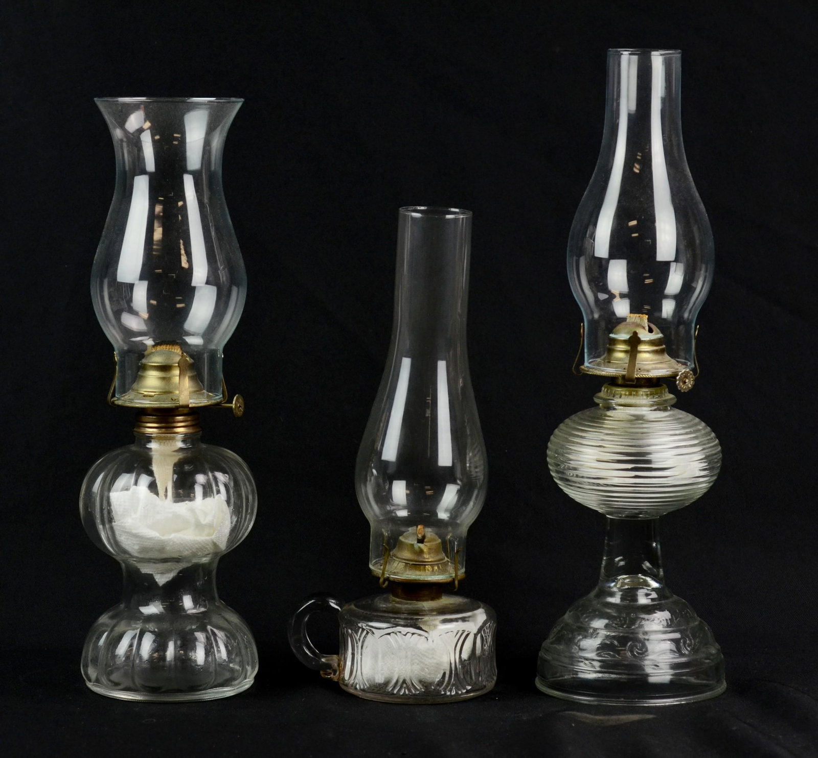 (3) Clear Glass Oil Lamps: (3) Clear Glass Oil Lamps Including Lamplight Farms and Finger Lamp