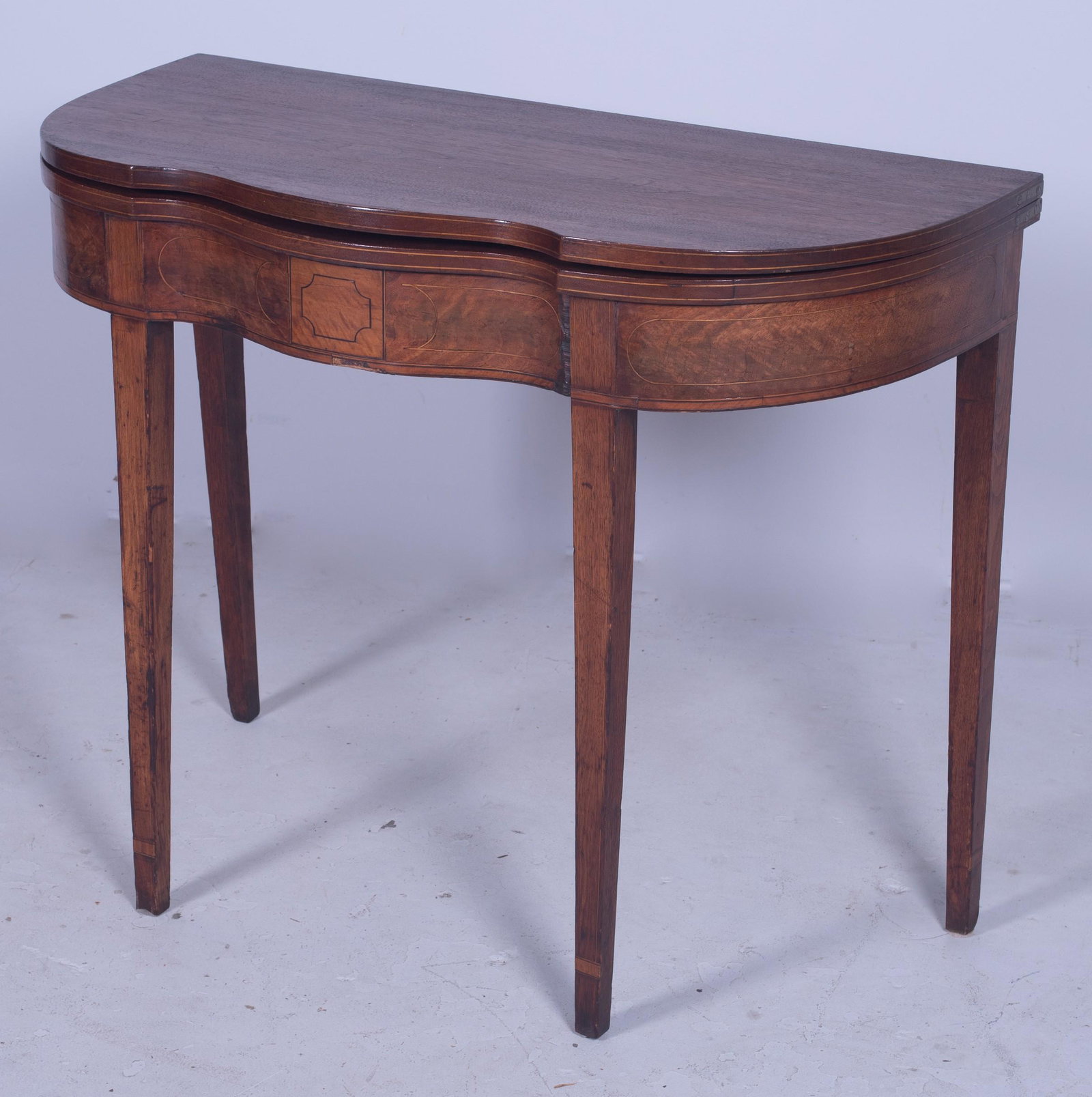 Hepplewhite inlaid flip top game table: Hepplewhite inlaid flip top game table, Serpentine front, 29" h x 36" w x 17-1/2" d