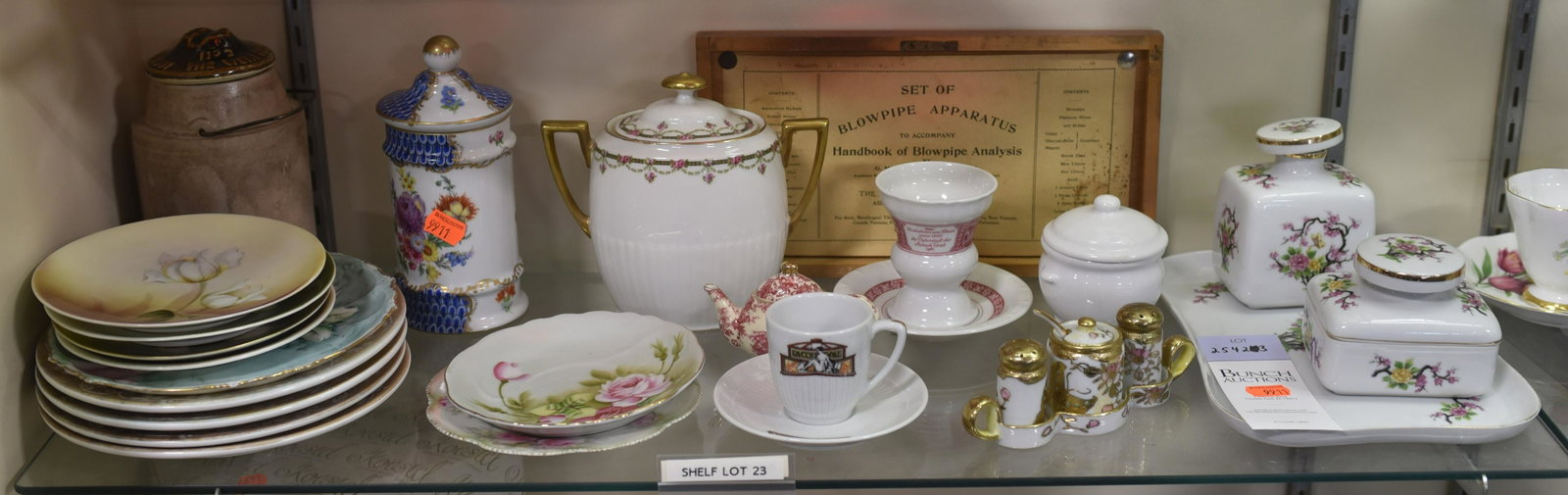 Shelf #23 - Porcelain Lot: Shelf #23 - Porcelain Including: Villeroy and Boch Cup and Saucer, Limoges Creamer (Hairlines on Bottom), Nippon Salt, Pepper and Relish Set, Toyo Canister, Dishes Including Lefton, RS Prussia, Bavari