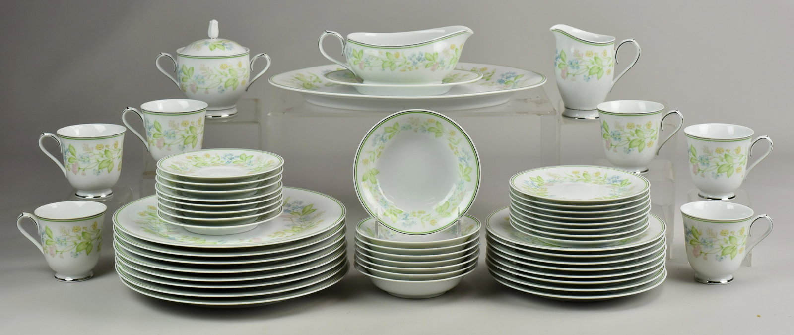 (50) Piece Noritake Essence Dinnerware: (50) Piece Noritake Essence Dinnerware Including: (8) Dinner Plates, (8) Salad Plates, (8) B and B Plates, (8) Fruit Bowls, (6) Teacups (8) Saucers, (1) Sauce Boat with Under Tray, (1) Oval Serving Bo