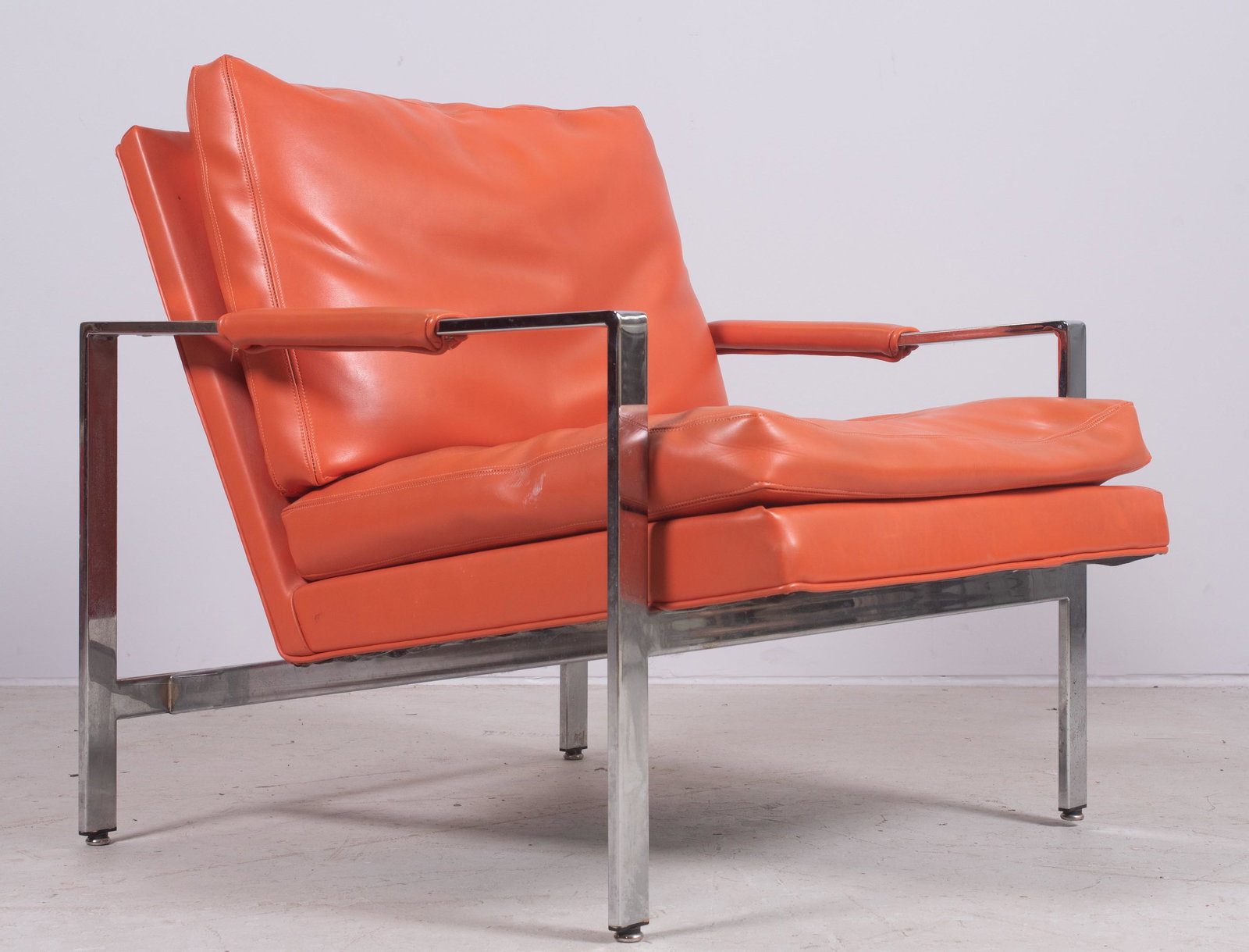 Milo Baughman for Thayer Coggin lounge chair: Milo Baughman for Thayer Coggin chrome & leather lounge chair, flat bar chrome frame with orange leather, 29"h x 30"w x 28"d