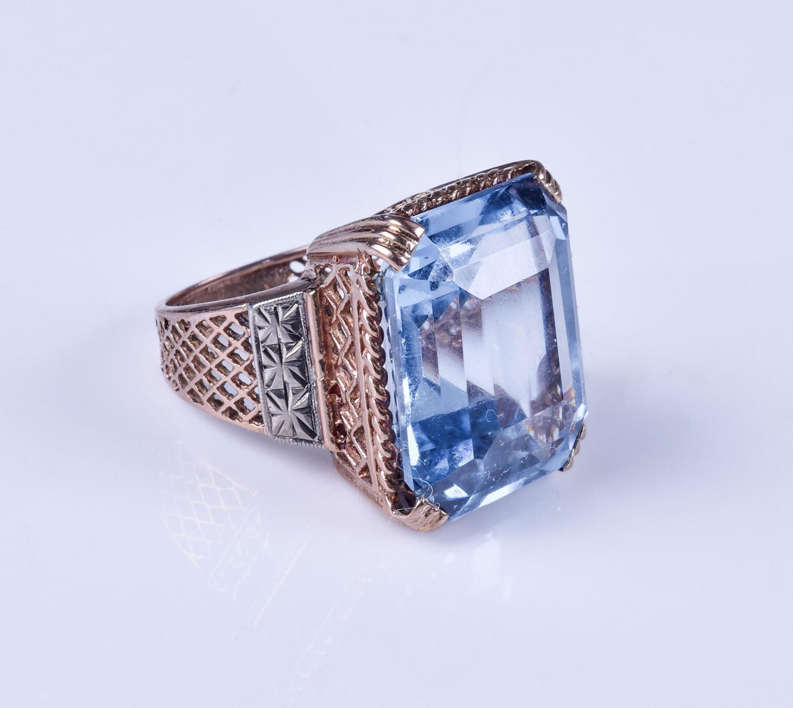 Unmarked 14K YG emerald cut topaz ring: Unmarked 14K YG emerald cut topaz ring, 21mm x 18mm x 11 mm, about 25-30 carats by calculation, size 6 1/2, 9.4 dwt