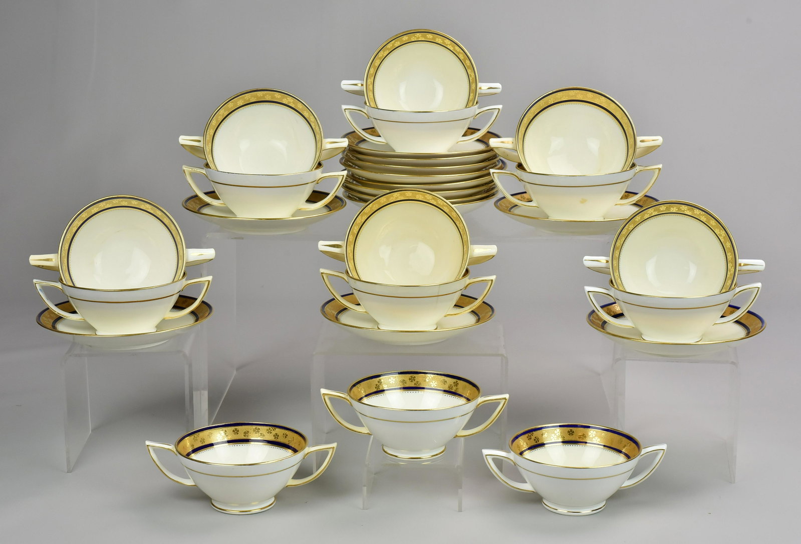 Mintons Tiffany & Co Cream Soups & Saucers: Mintons porcelain (15) cream soup bowls & (13) saucers, (10 each marked Tiffany & Co), cobalt blue & gold border