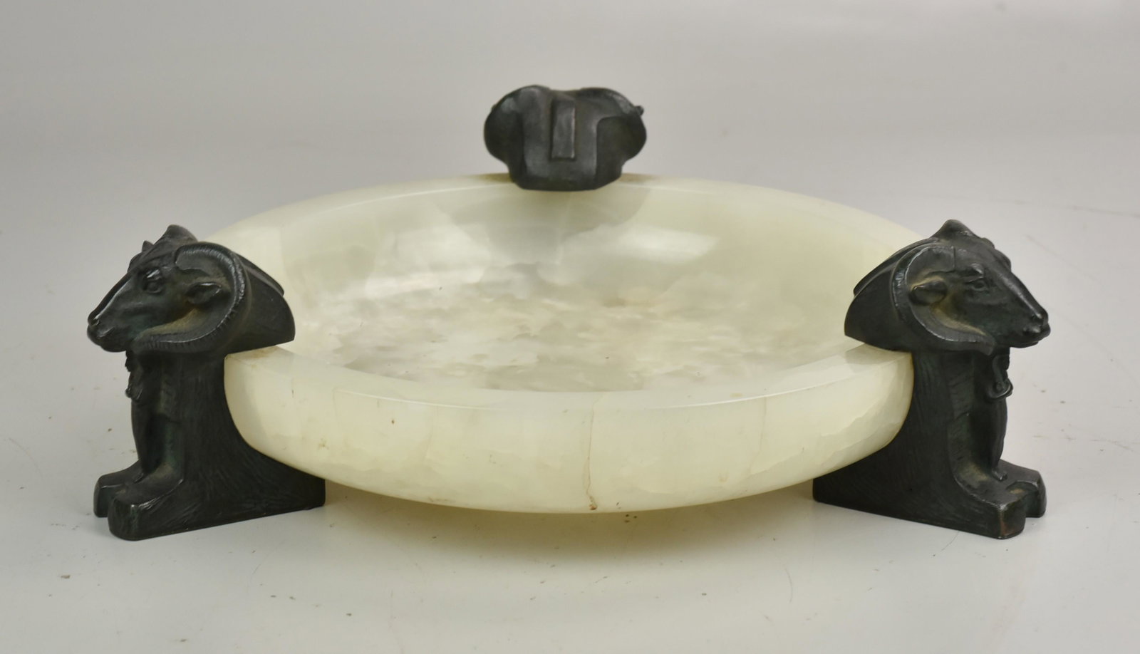 Onyx Bowl, Cast Iron Sphynx Feet: Onyx stone round bowl with 3 cast iron sphynx bull feet, bowl 11-3/4" dia x 2-/2" h, 4" h overall: . Provenance: This lot comes from the Hopkinson Family Collection, Francis Hopkinson, 1737-1791 was a