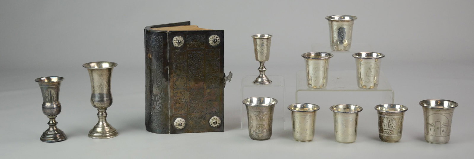 Silver Kiddush Cups and Torah: (8) Sterling Silver Kiddush Cups (8.9 TO), (3) Russian Silver Kiddush Cups (5.1 TO), Torah with Clasp Stamped Jerusalem St. 925