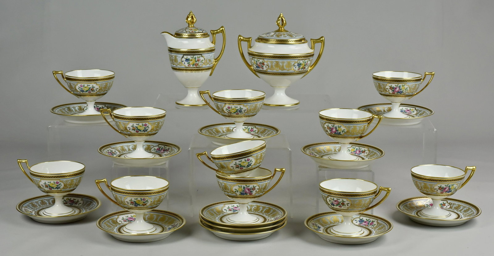 (25) Pcs Haviland Limoges Dinnerware: (25) Pcs CH Field Haviland Limoges porcelain dinnerware, gold with black laurel border with floral medallions, c/o (11) pedestal footed teacups, (12) saucers, footed sugar bowl and creamer with pierce