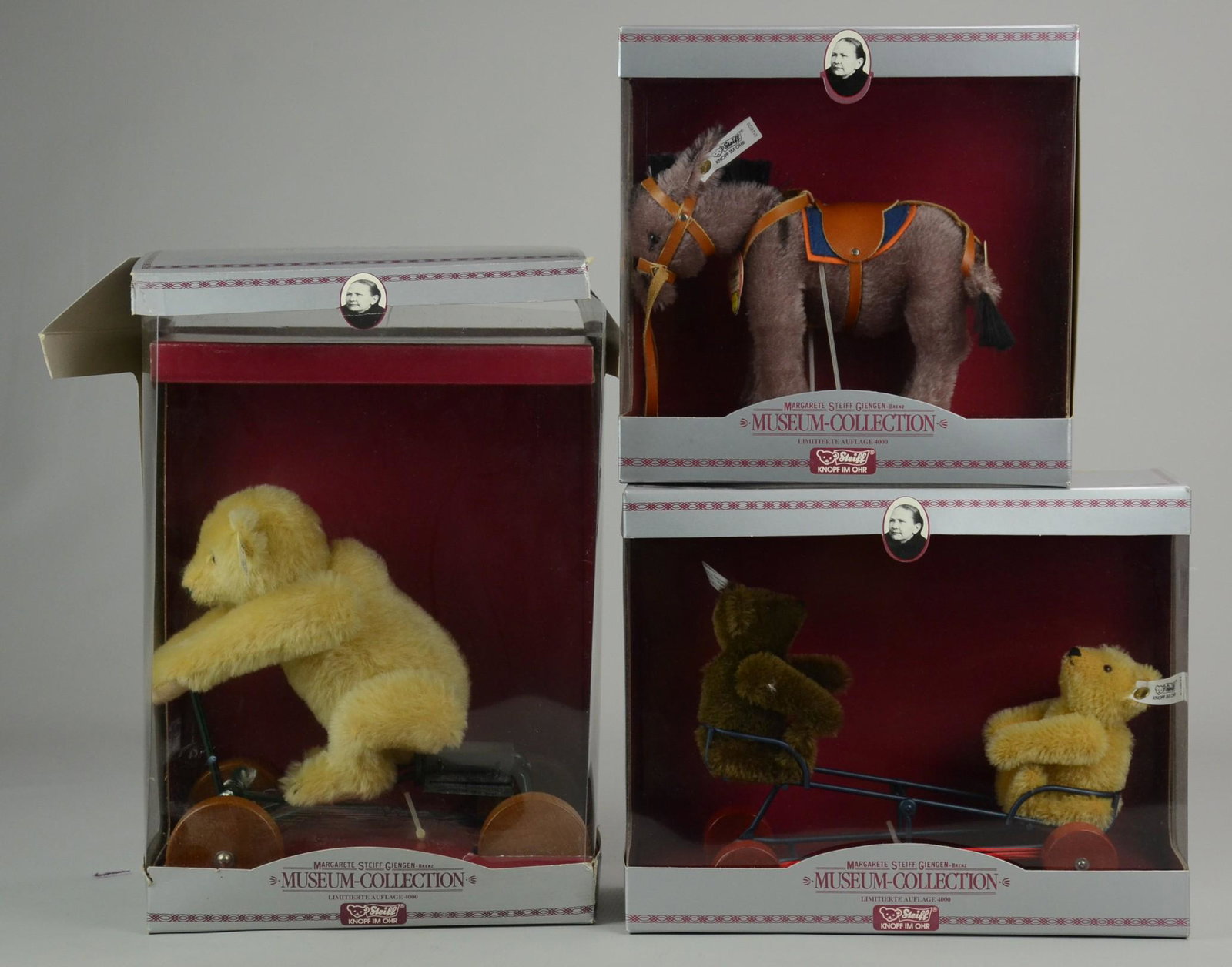 (3) Steiff Pieces: (3) Steiff pieces c/o NIB seesaw bears, scooter bear and donkey