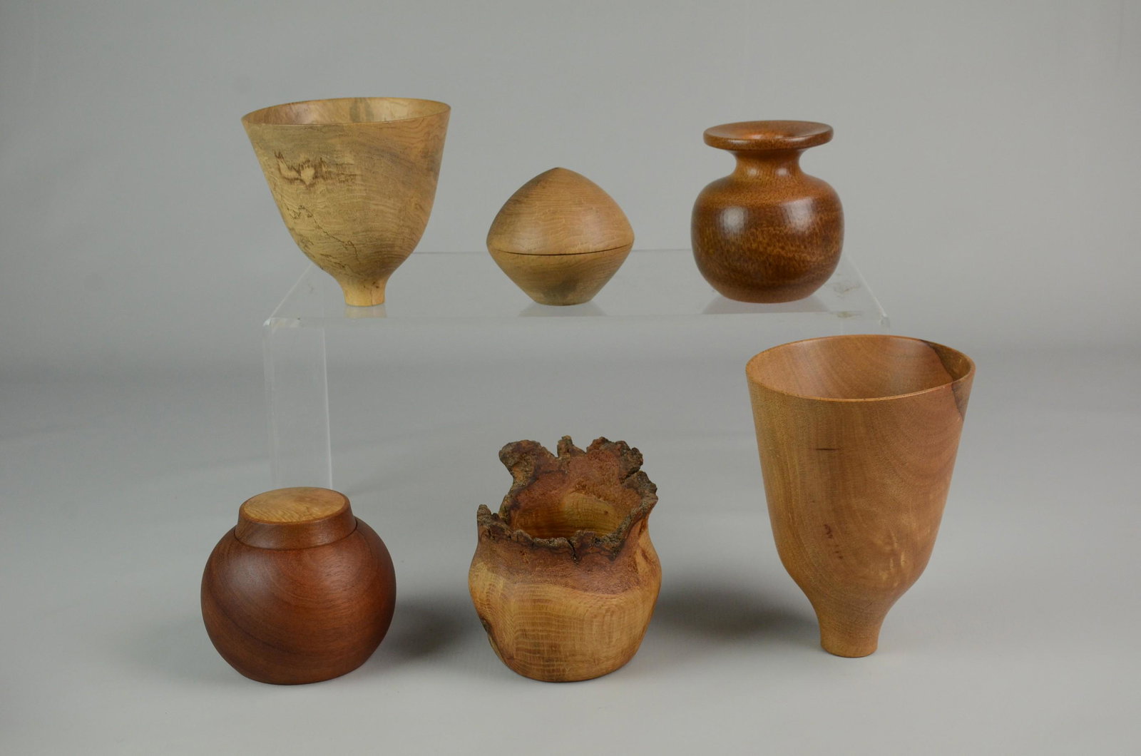 (6) Artisan Wood Pieces: (6) Artisan Wood Pieces Including: (3) Signed John Linek Pieces: Acorn Shaped Box, (2) Funnel Cups, Jim Cumberland Wood Vase, Wood Vase Signed Illegibly, (Tallest 7" h)