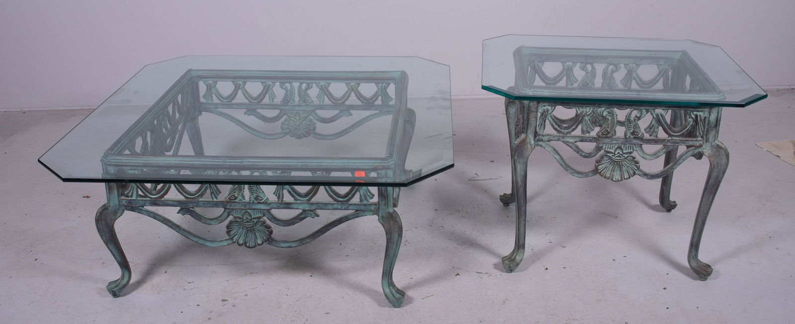 Italian style metal glasstop coffee table side table: Italian style pierced metal glass top coffee table and side table, beveled glass tops, base with dolphin and shell decoration, faux green painted patina, 16" h x 40-1/4"square, side table 21-1/2" h x