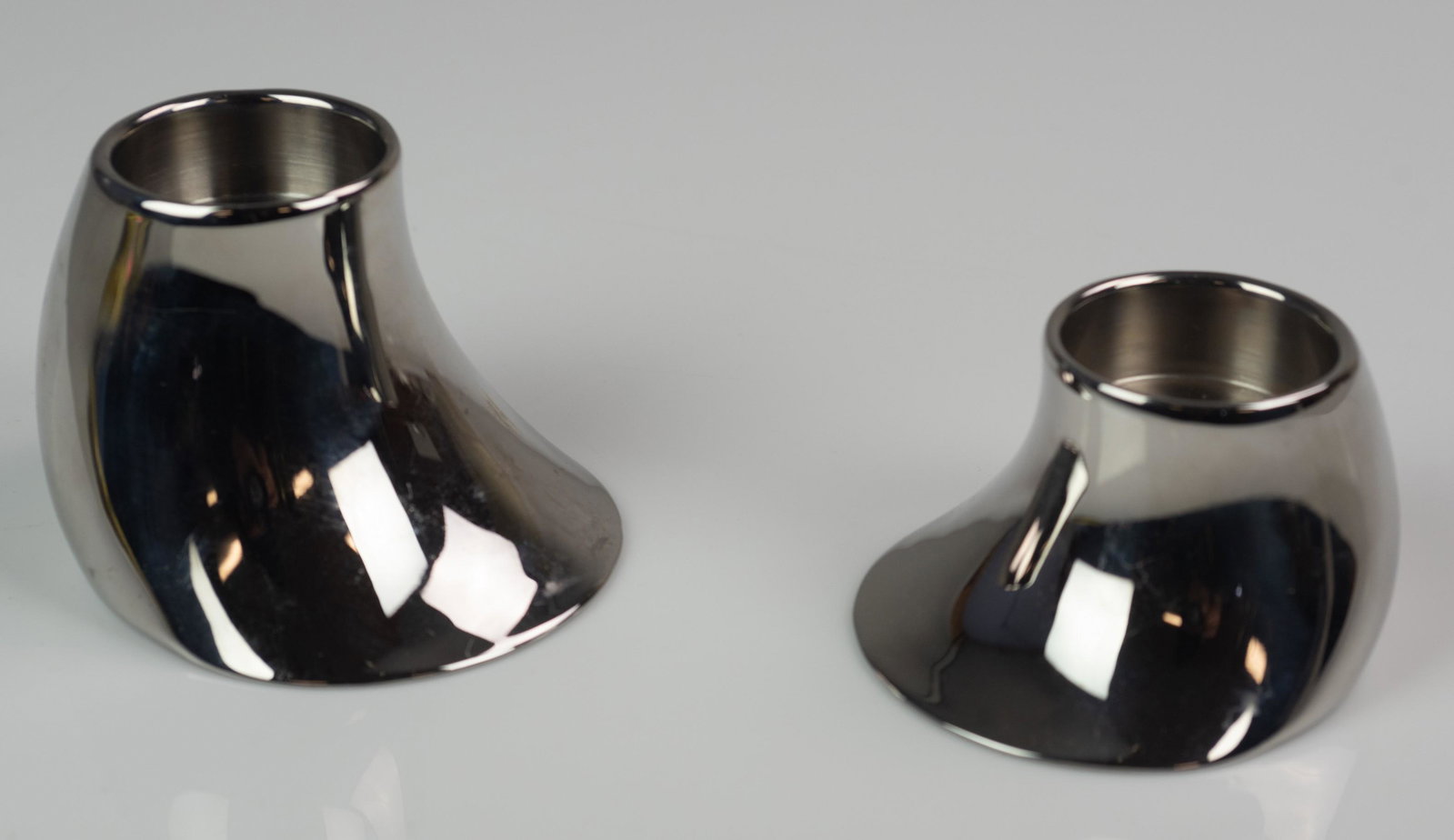 (2) Georg Jensen Cobra Tealights: (2) Georg Jensen Cobra chrome tealights, largest 3-3/4" x 3-1/2" x 2-5/8"
