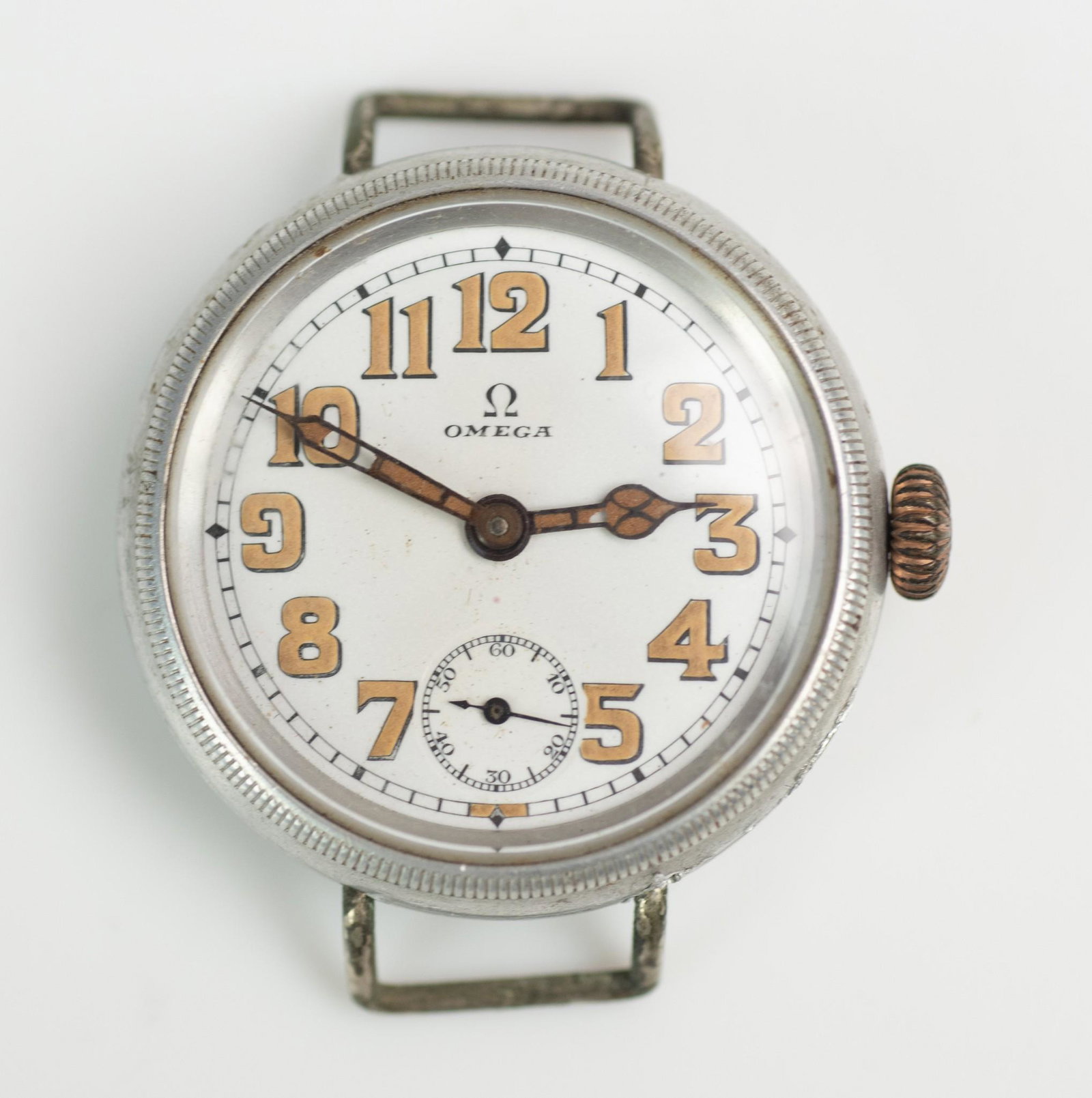 1940-50 era Omega men's wrist watch: 1940-50 era Omega men's wrist watch, silver color case and dial, gold tone arabic numerals, 37 mm diam, not running