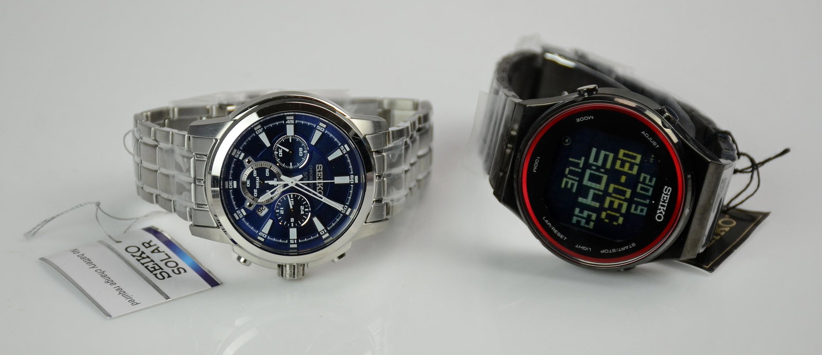 (2) Seiko Men's black watches: (2) Seiko Men's black watches, c/o one with digital timer and stopwatch, 100M, Water Resistant, Serial STP013, other 100M, Water Resistant, Serial SGEG25