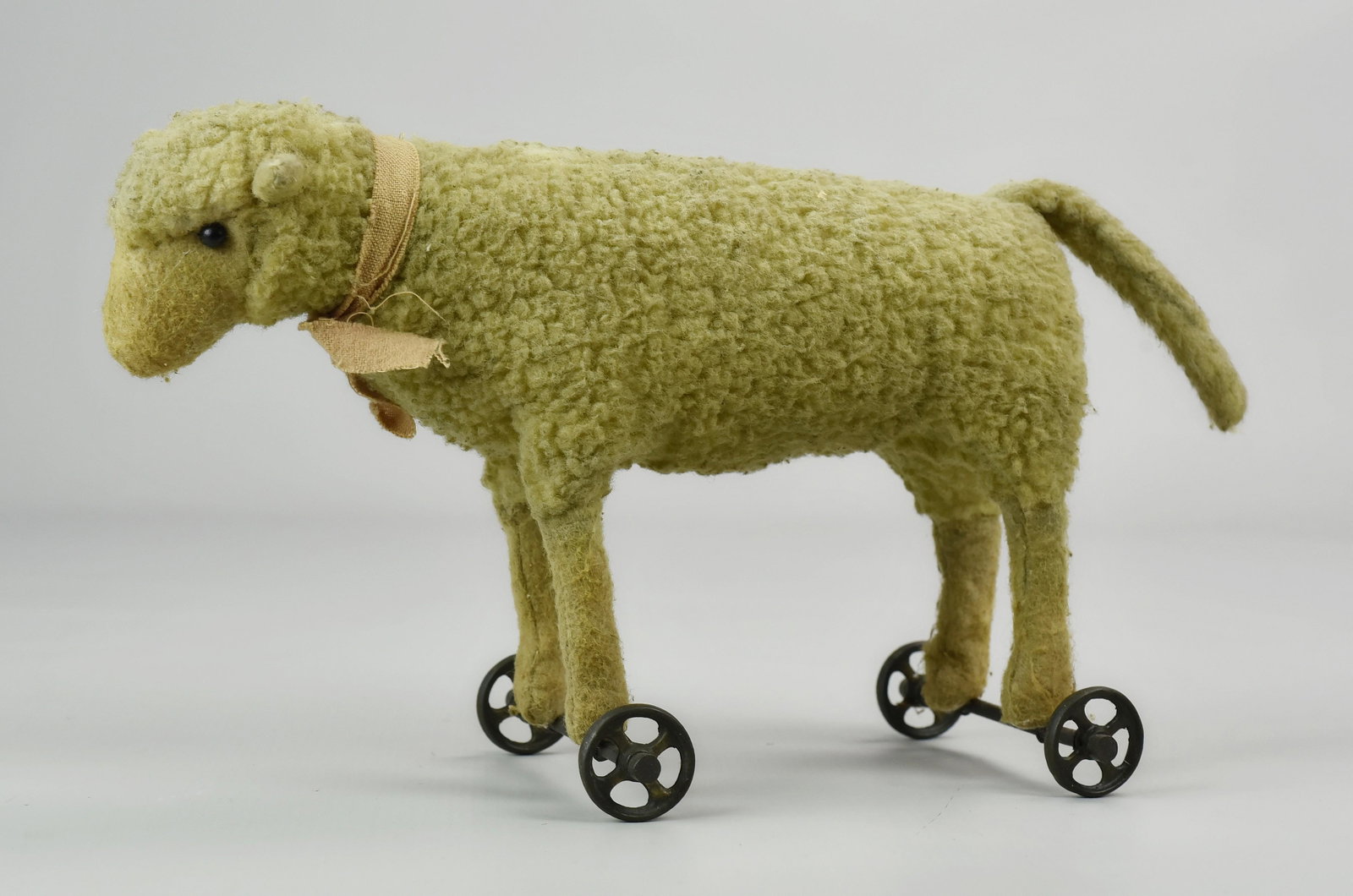 Stuffed Steiff Lamb Pull Toy: Steiff lamb (stuffed) pull toy on metal wheels - 11" l (c. 1910-1920, Germany)