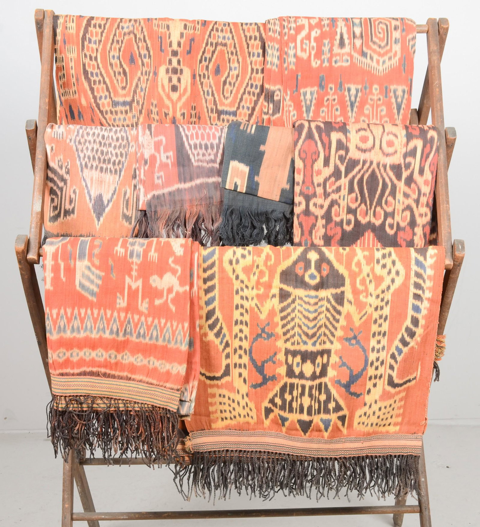 (7) Sumba Ikat Hingii: (7) Indonesian East Sumba ikat hingii, several with fringe edge. Comprised of red/orange, yellow and blue.