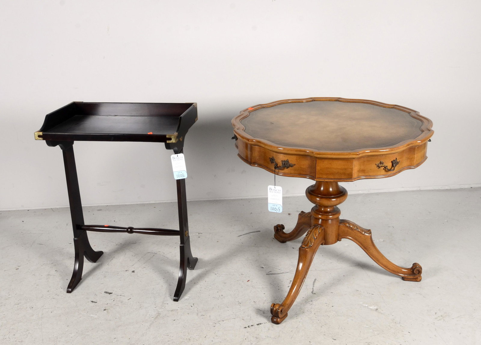 Walnut finished French style drum table: Walnut finished French style drum table, piecrust top, pedestal with acanthus leaf decoration, one drawer, along with Bombay Co mahogany console table, drum table 30"h x 32"diameter