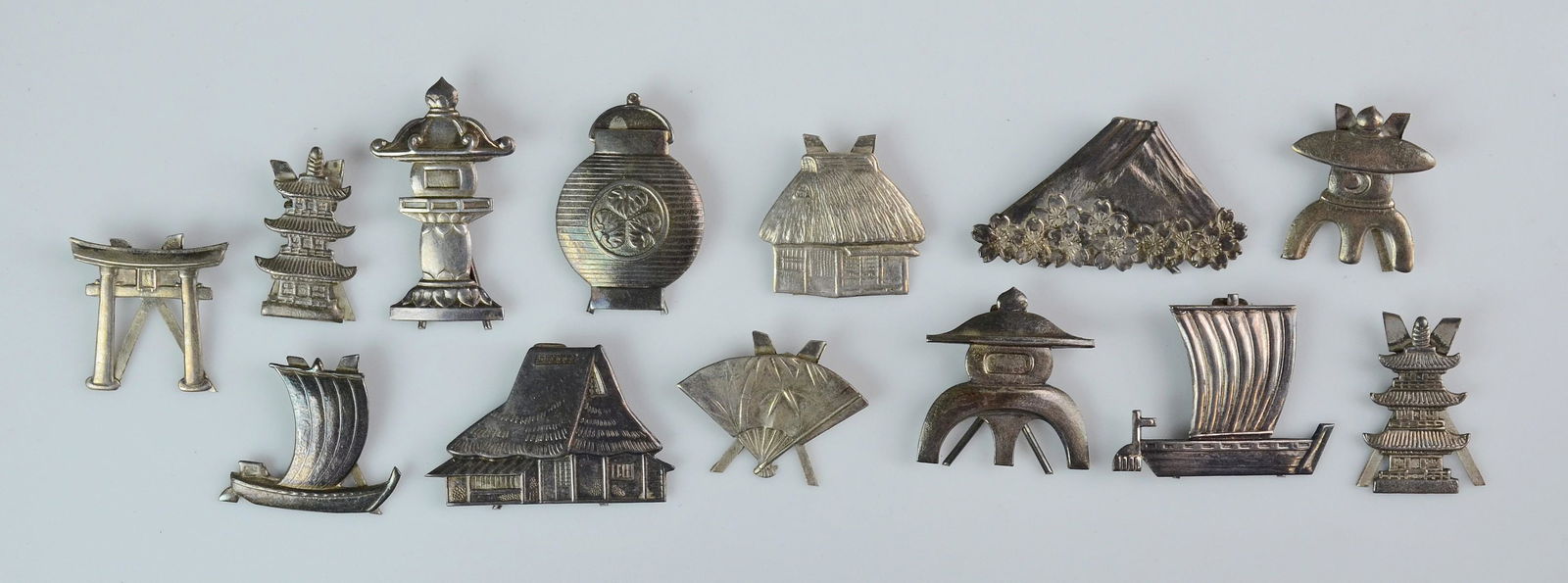 (13) Japanese 950 silver place card holders: (13) Japanese 950 silver place card holders, c/o (6) Matoba 950, (7) K Uyeda, tallest 1-3/4", 1.61 TO