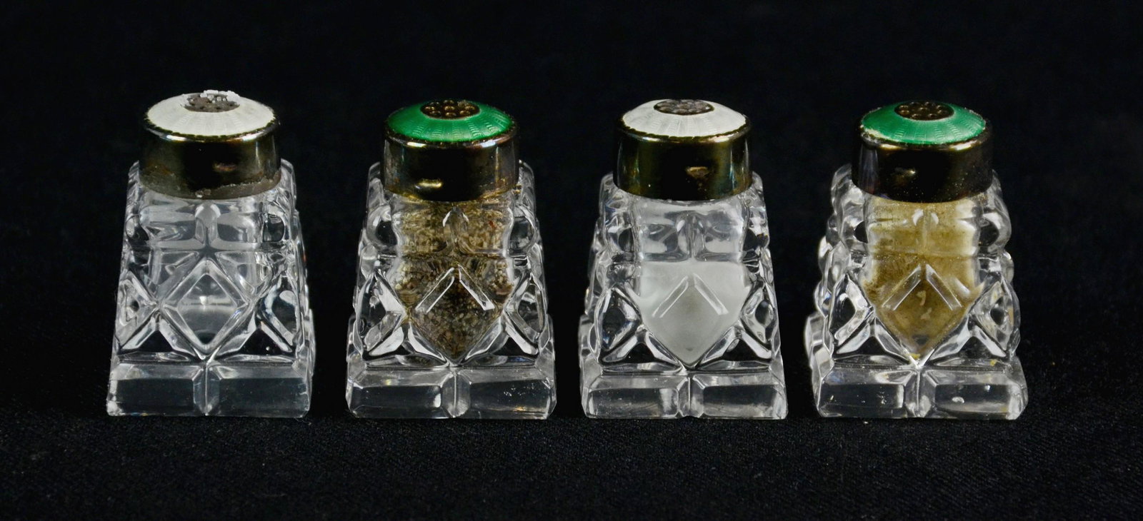 (4) Norwegian Sterling & Enamel Topped Shakers: (4) Norwegian cut crystal shakers, sterling tops with green & white enamel, 1-1/4" sq x 1-3/4" h