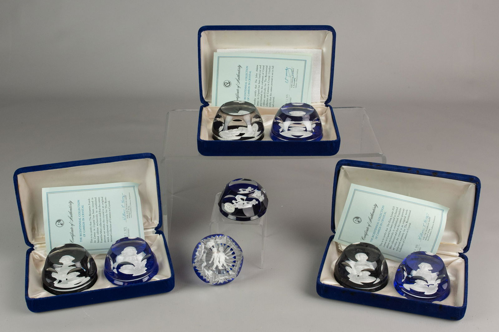 (8) Baccarat Sulfide Cobalt Paperweights: (8) Baccarat crystal cobalt blue sulfide paperweights, c/o 6 Franklin Mint Bicentennial Collection of Cameos in Crystal in velour boxes (Benjamin Franklin, King Louis XVI, Baron de Montesquien, John A